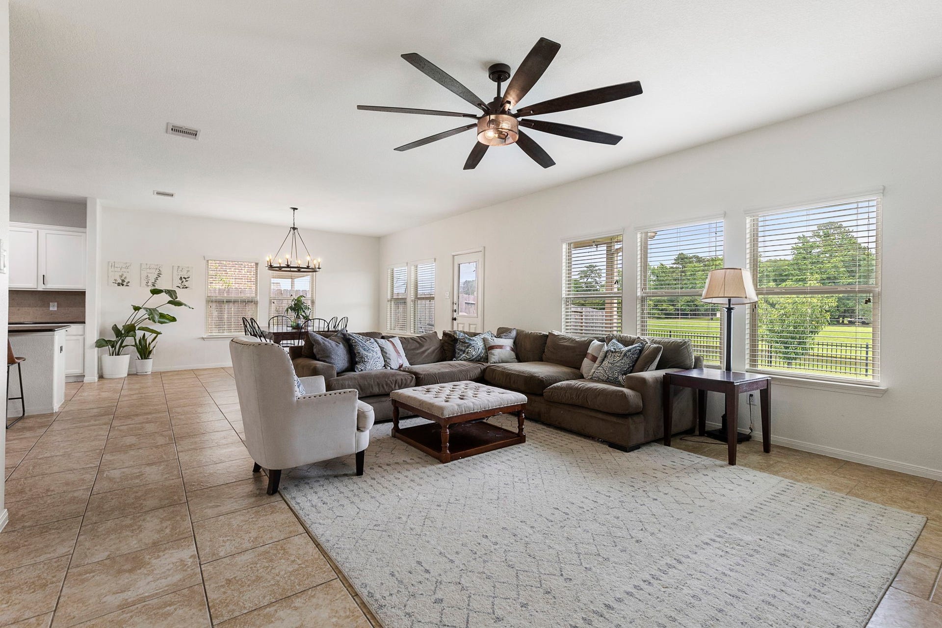 22810 Dale River Road, Tomball, TX 77375 This large den is big enough for your oversized furniture and has the best backyard views.