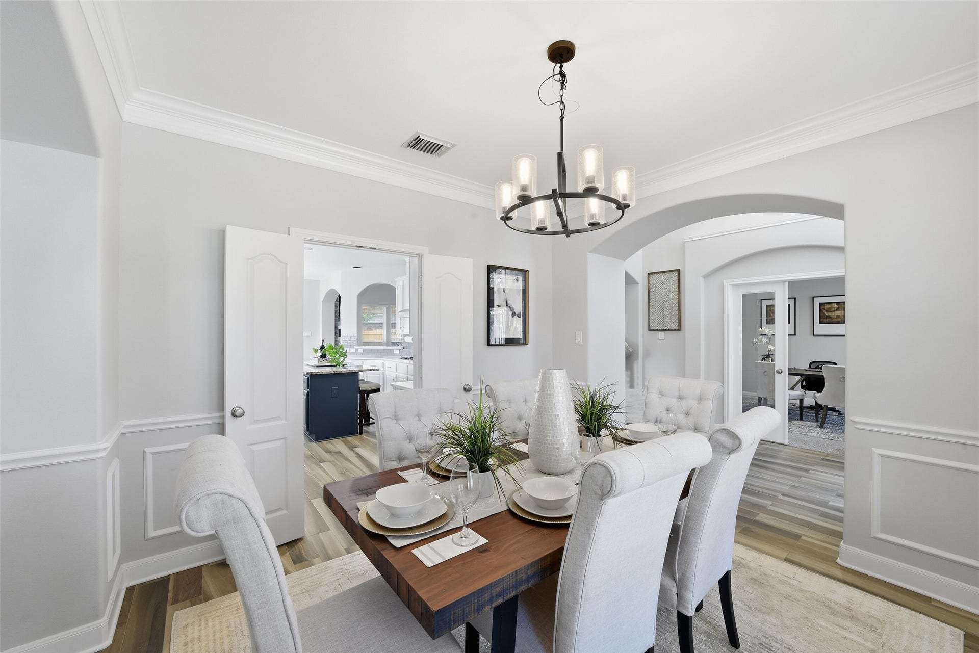 2710 Golden Larch Drive, Katy, TX 77494 To the left of the foyer is a formal dining room with crown and picture frame molding.