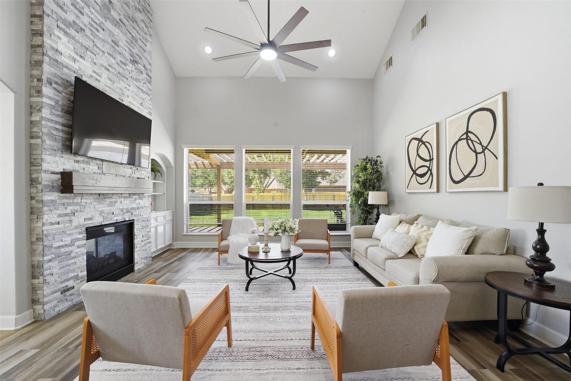 2710 Golden Larch Drive, Katy, TX 77494 Enjoy high ceilings, an updated fireplace and new ceiling fan in the main family room.
