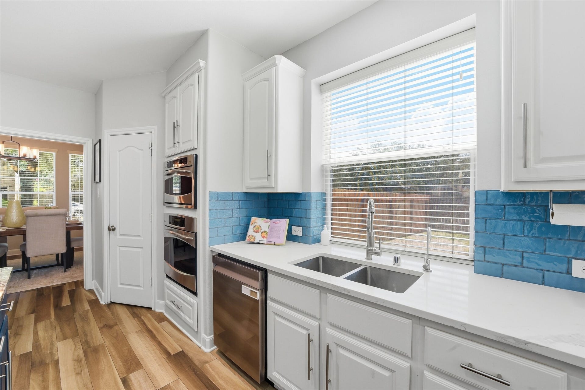2710 Golden Larch Drive, Katy, TX 77494 Enjoy a view of the yard while working at the kitchen sink.