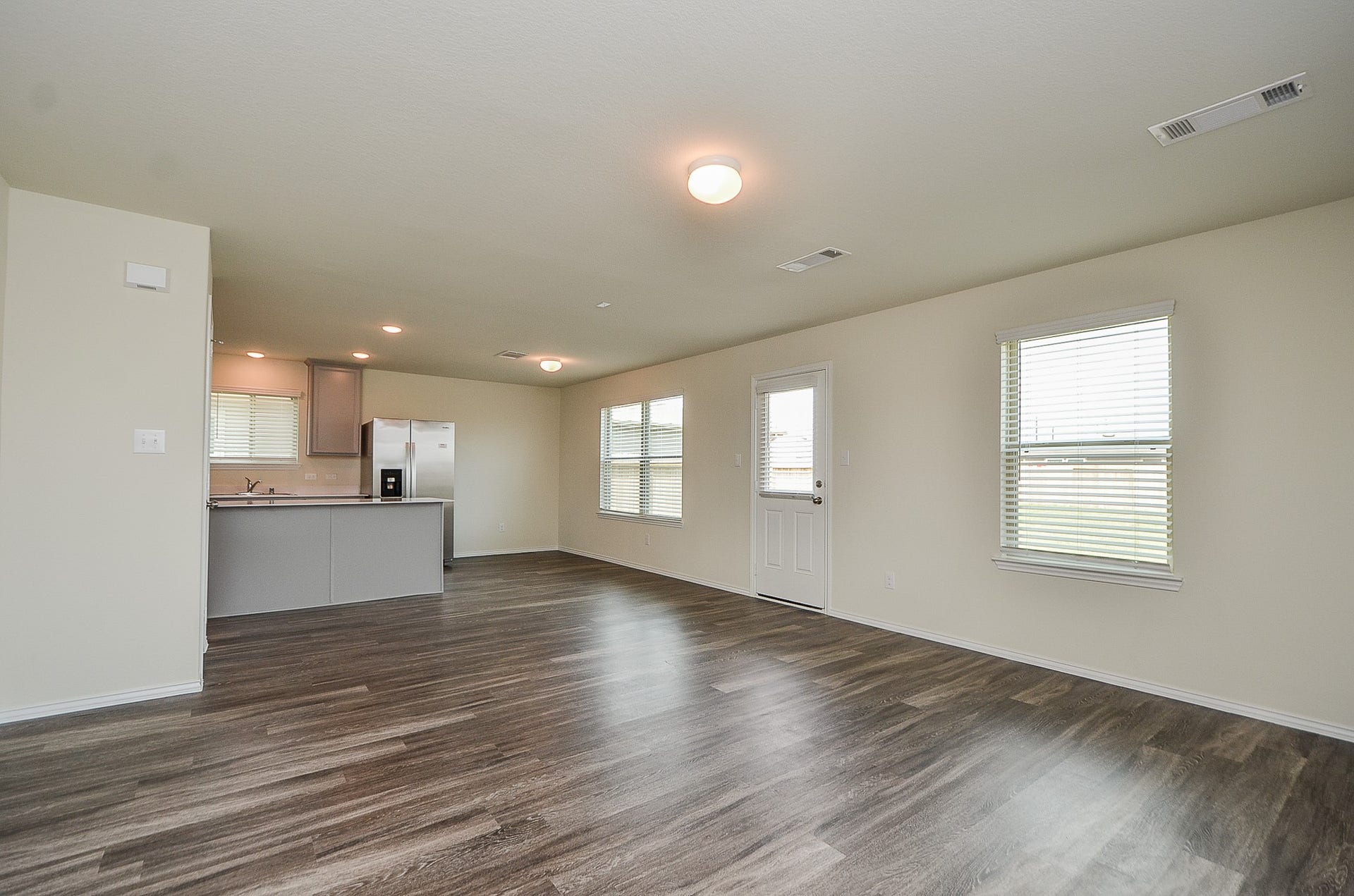 The main rooms feature luxury vinyl plank flooring that seamlessly connects each room & provides open concept living!