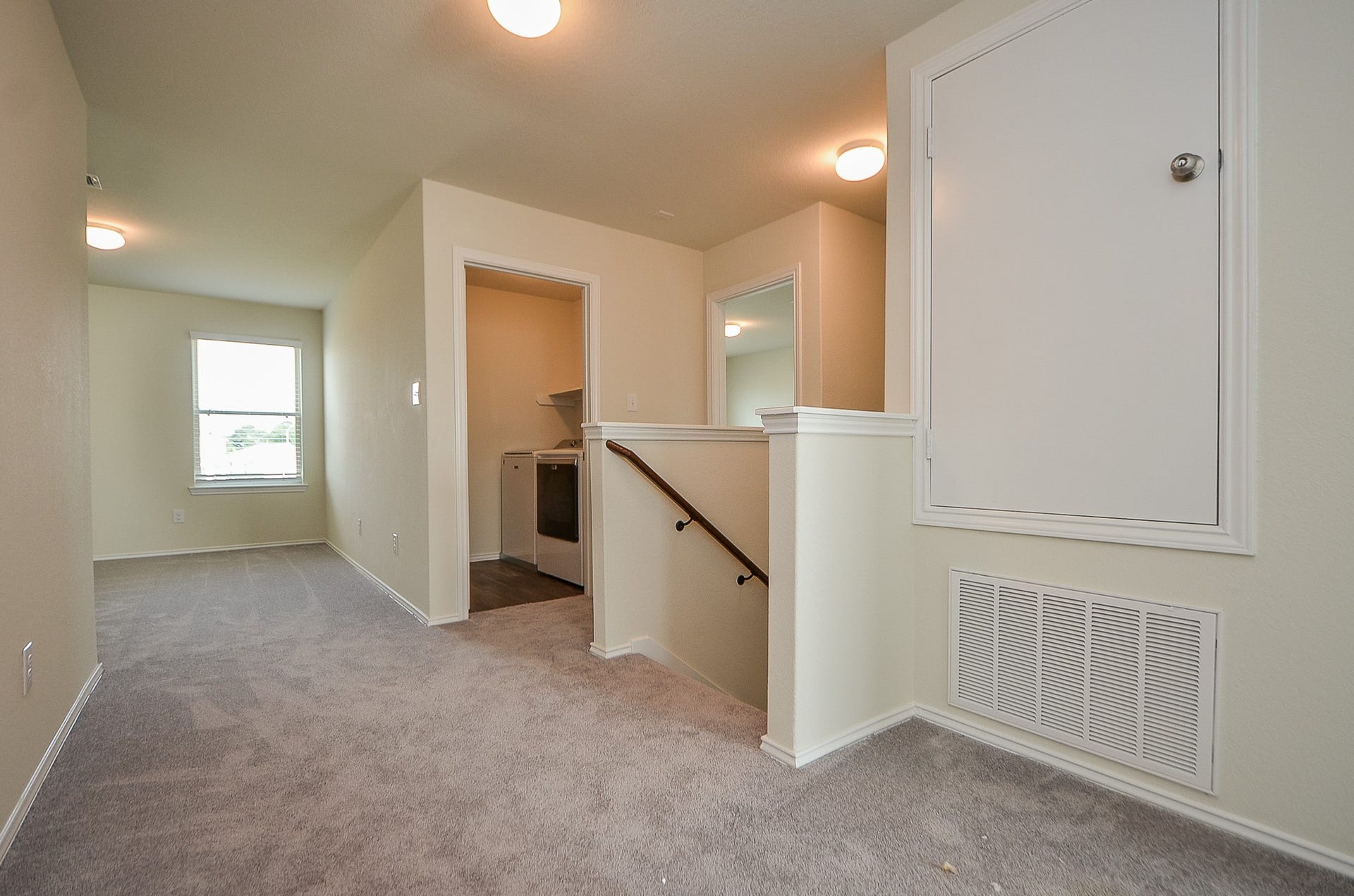 Upstairs laundry room is very convenient!