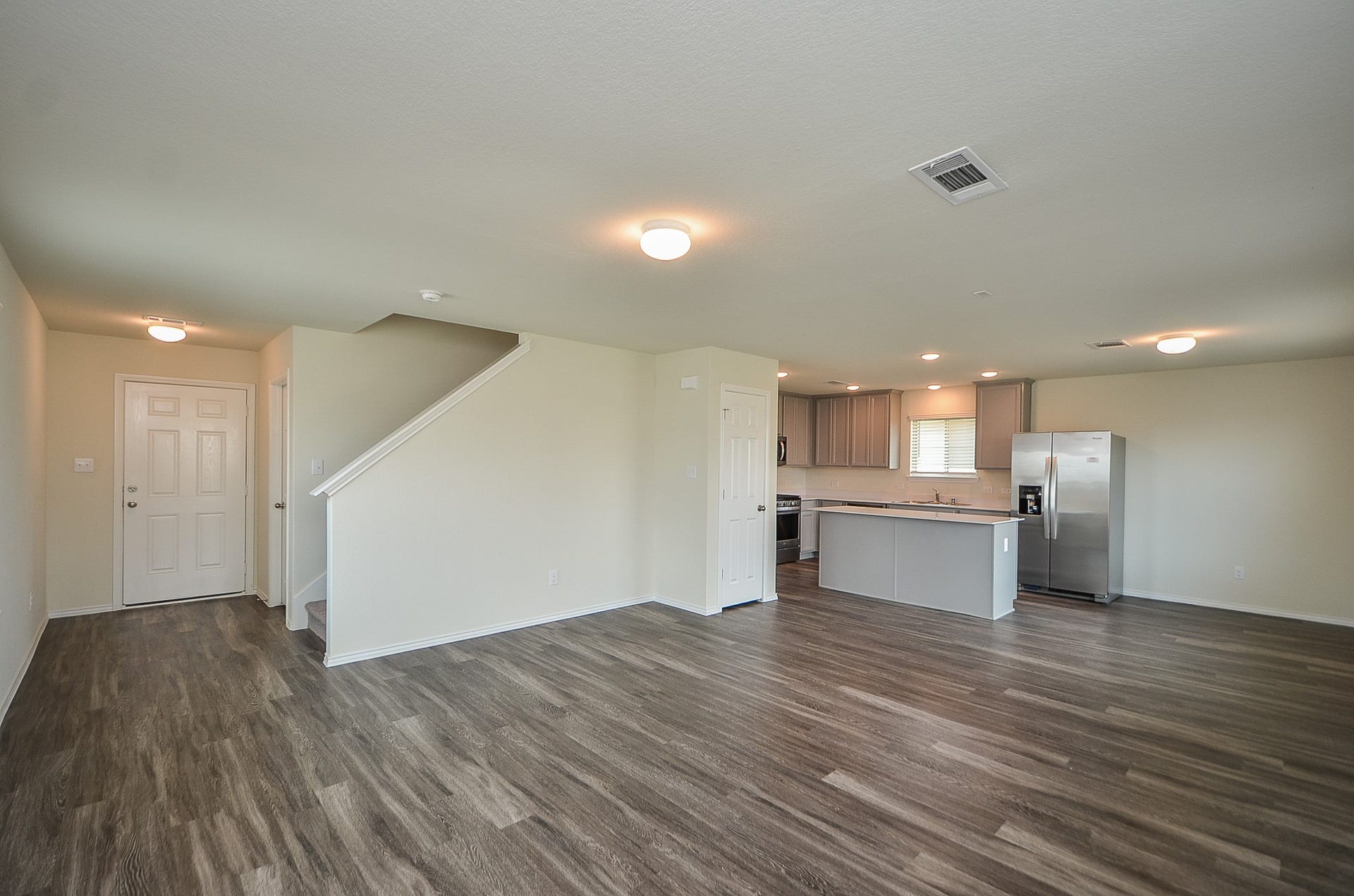 When you enter this brilliant home, you'll find a 1/2 bath to the left & stairs leading to upper level. Ahead ample living space!