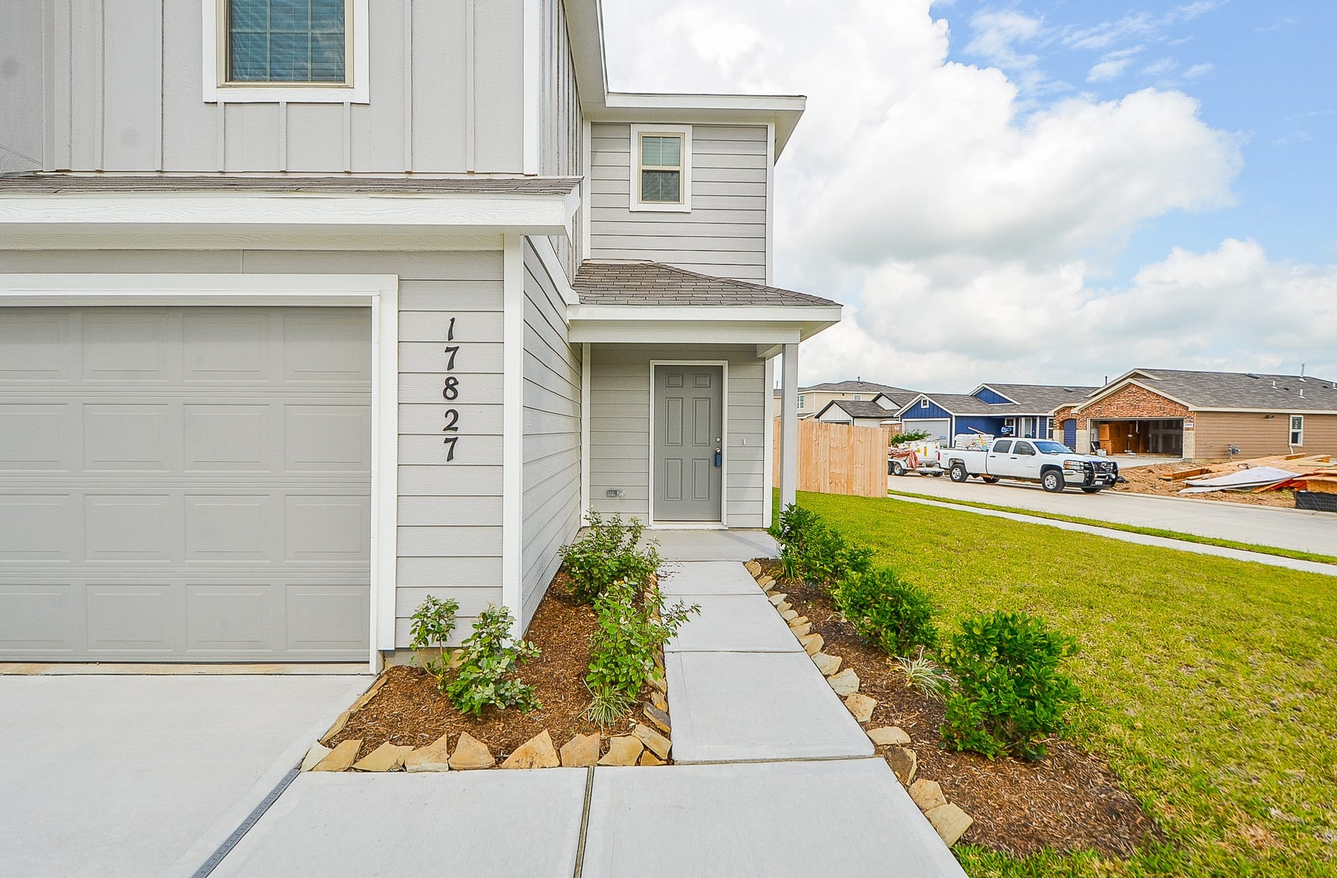 No neighbors on 2 sides w/ this fabulous corner lot! 2-car garage & openers included.