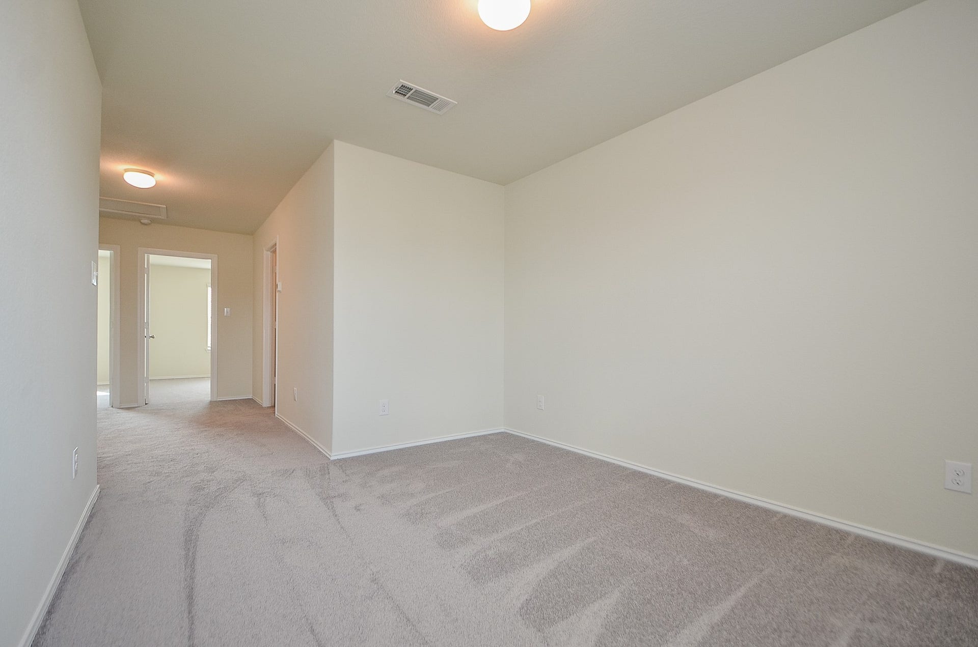 Rare Pierce 2-story floor plan features a bonus upstairs game room or alternate TV room.