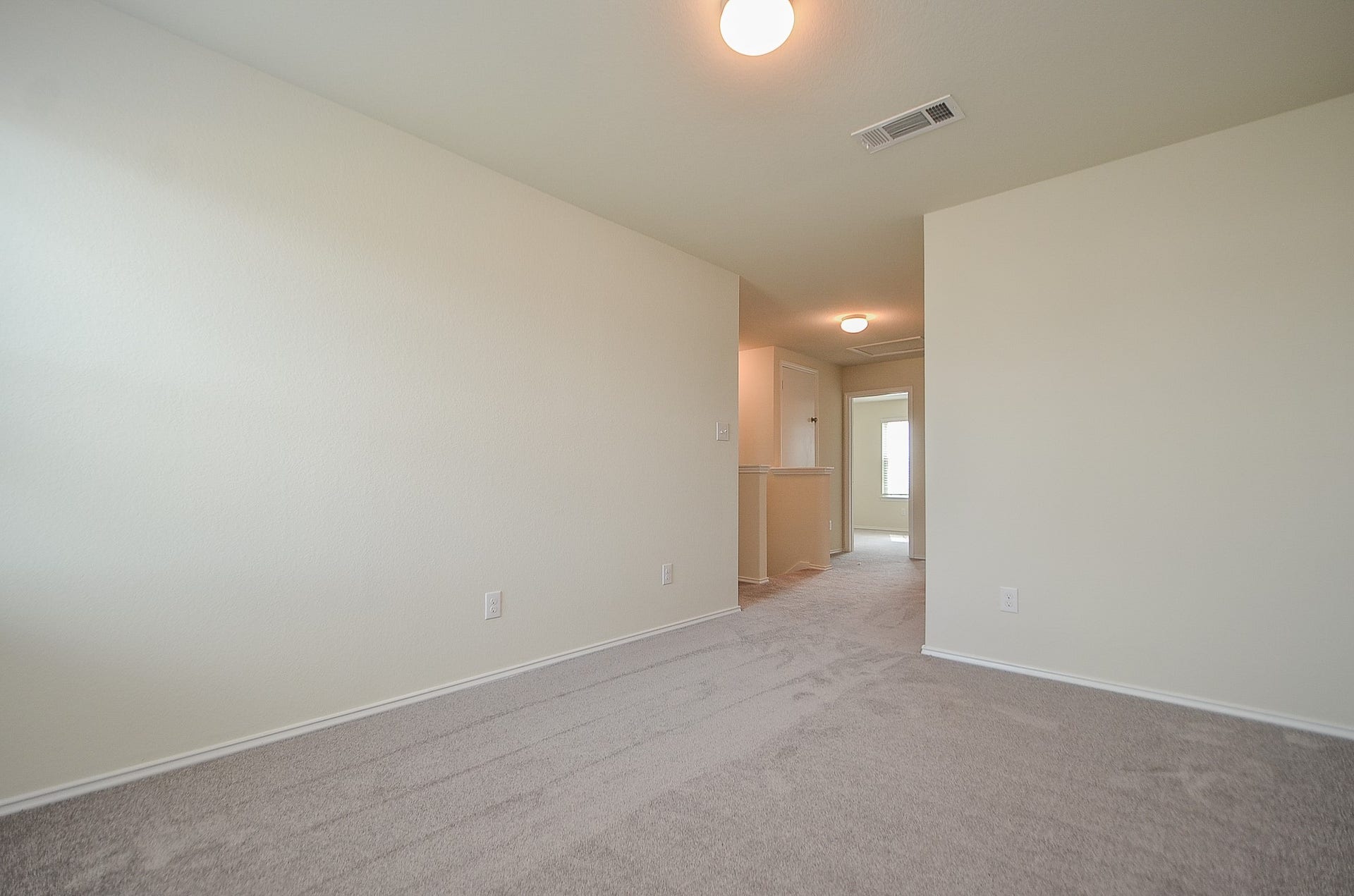 View of the upstairs game room/flex space.