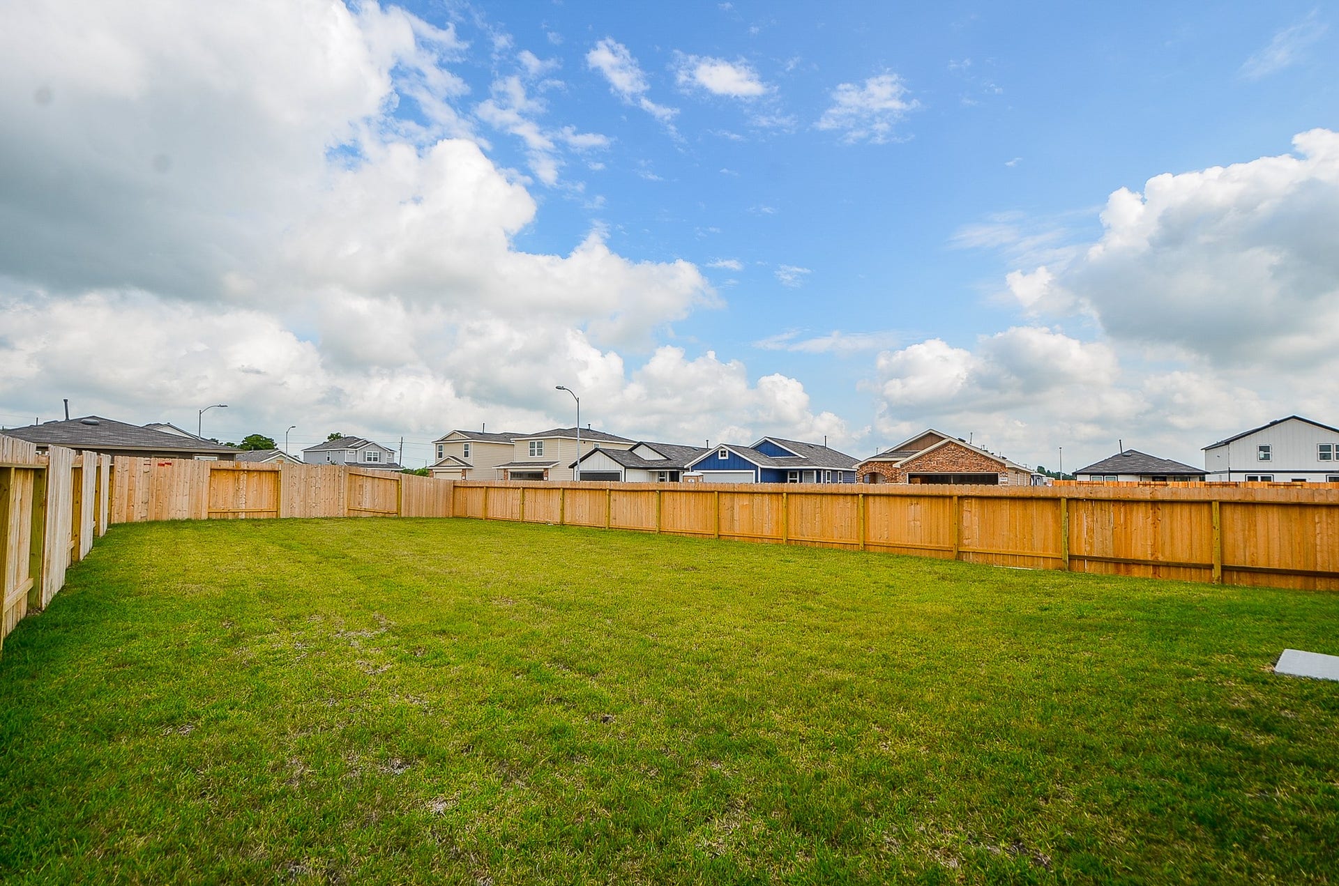 Another view of the large backyard & surrounding neighborhood. You'll have lots of privacy here!