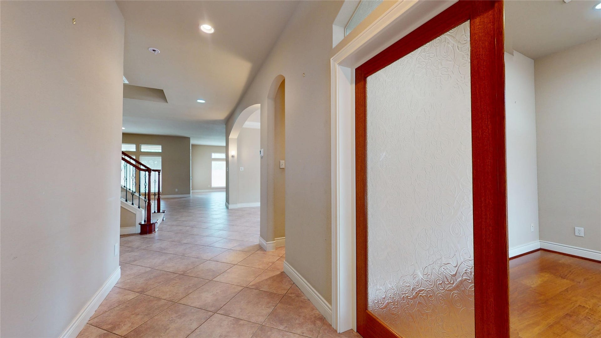 3502 Urban Woods Trail, Houston, TX 77008 As you enter the property, the first room to the right is a study with gorgeous, custom glass doors and transom...