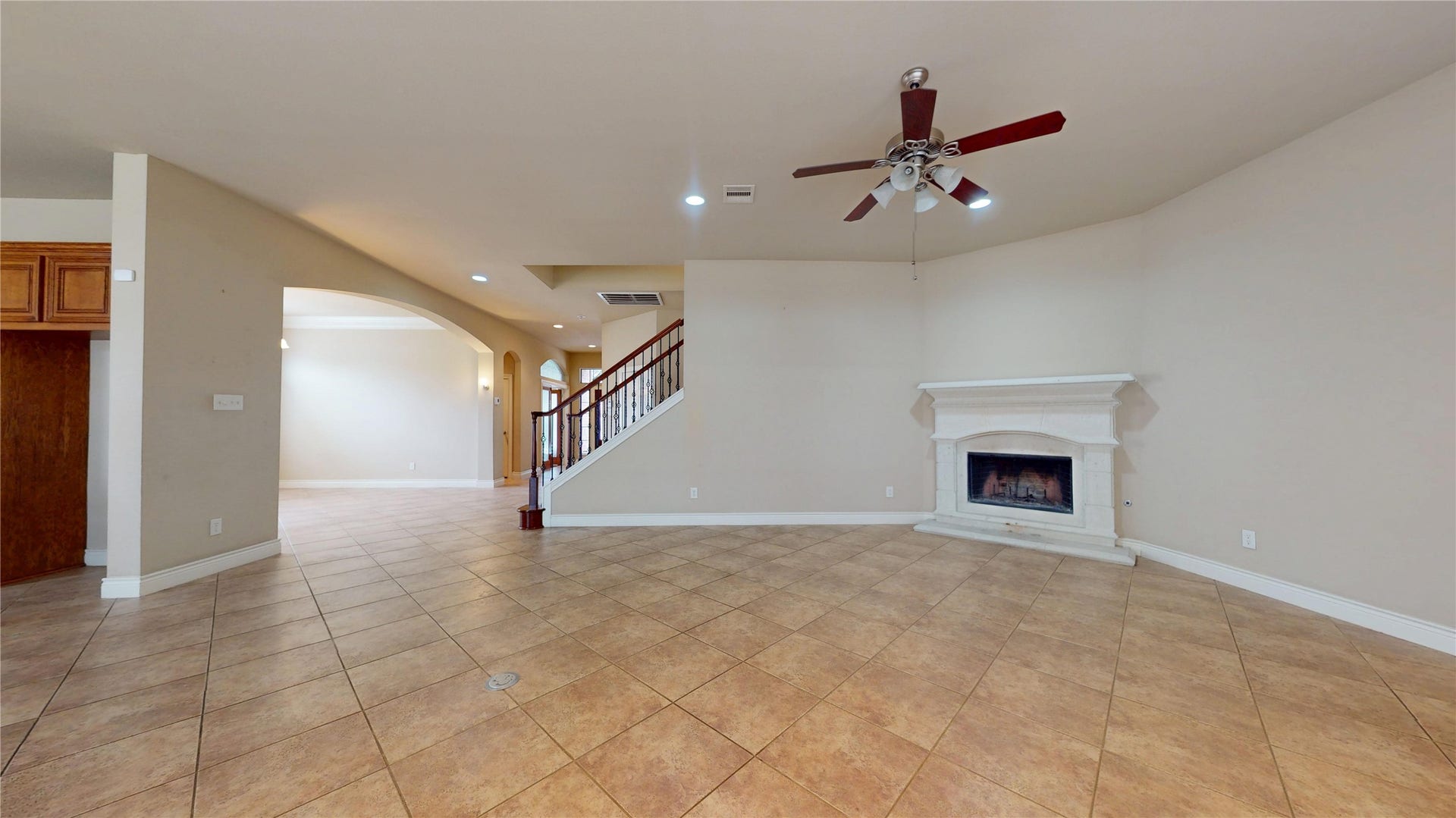 3502 Urban Woods Trail, Houston, TX 77008 Den with gas log fireplace, direct access to the kitchen area and the covered patio...