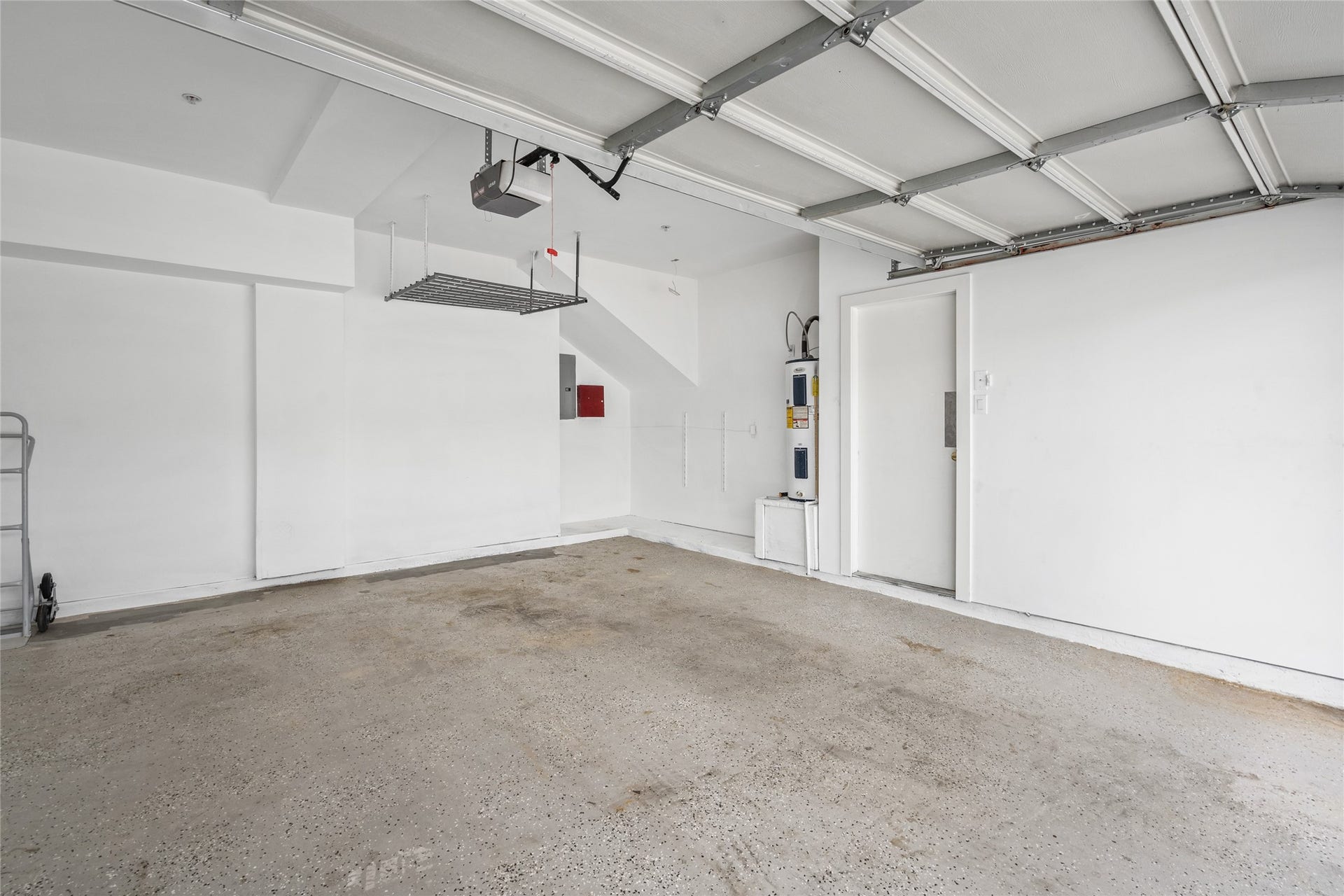 5712 Winsome Lane, #5, Houston, TX 77057 Spacious garage offering secure parking and additional storage, providing both convenience and functionality.