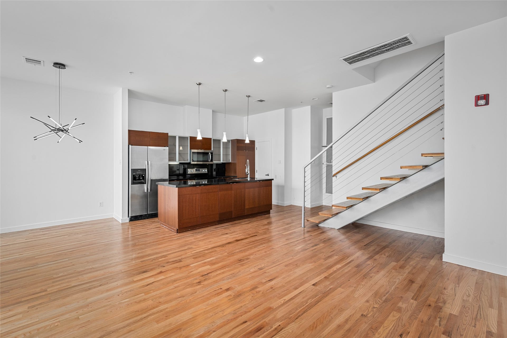 5712 Winsome Lane, #5, Houston, TX 77057 The open concept layout ensures you're always in the know, whether you're in the kitchen, dining, or living area, creating a connected and cohesive space for family and guests to enjoy.