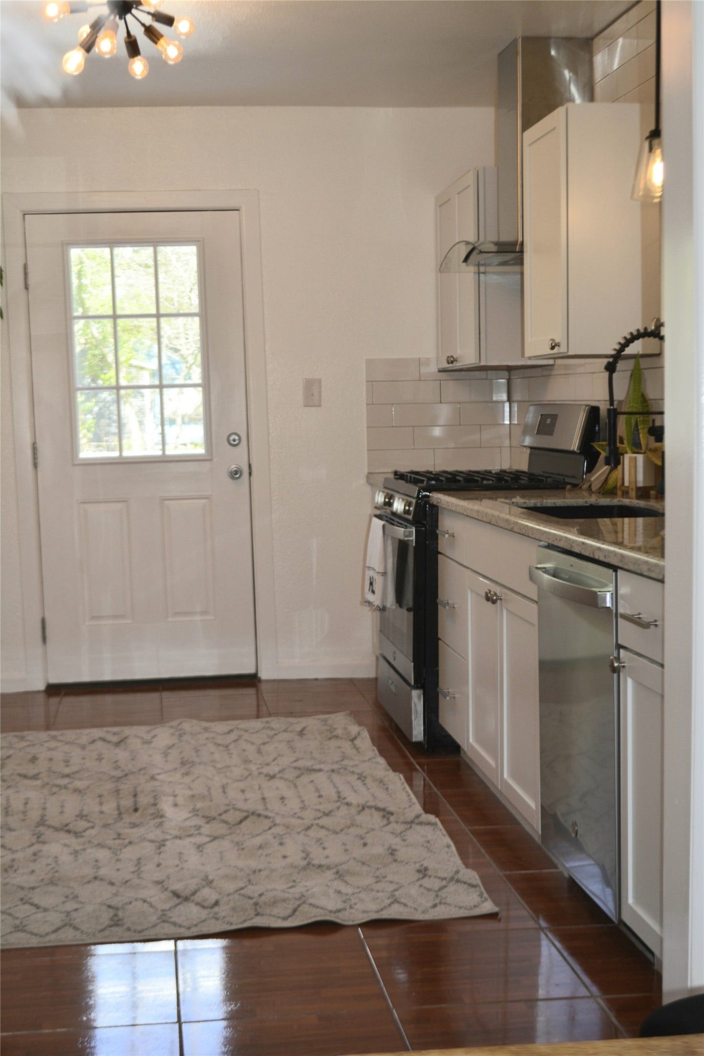 828 Holly Street, La Marque, TX 77568 Kitchen with door leading to back porch