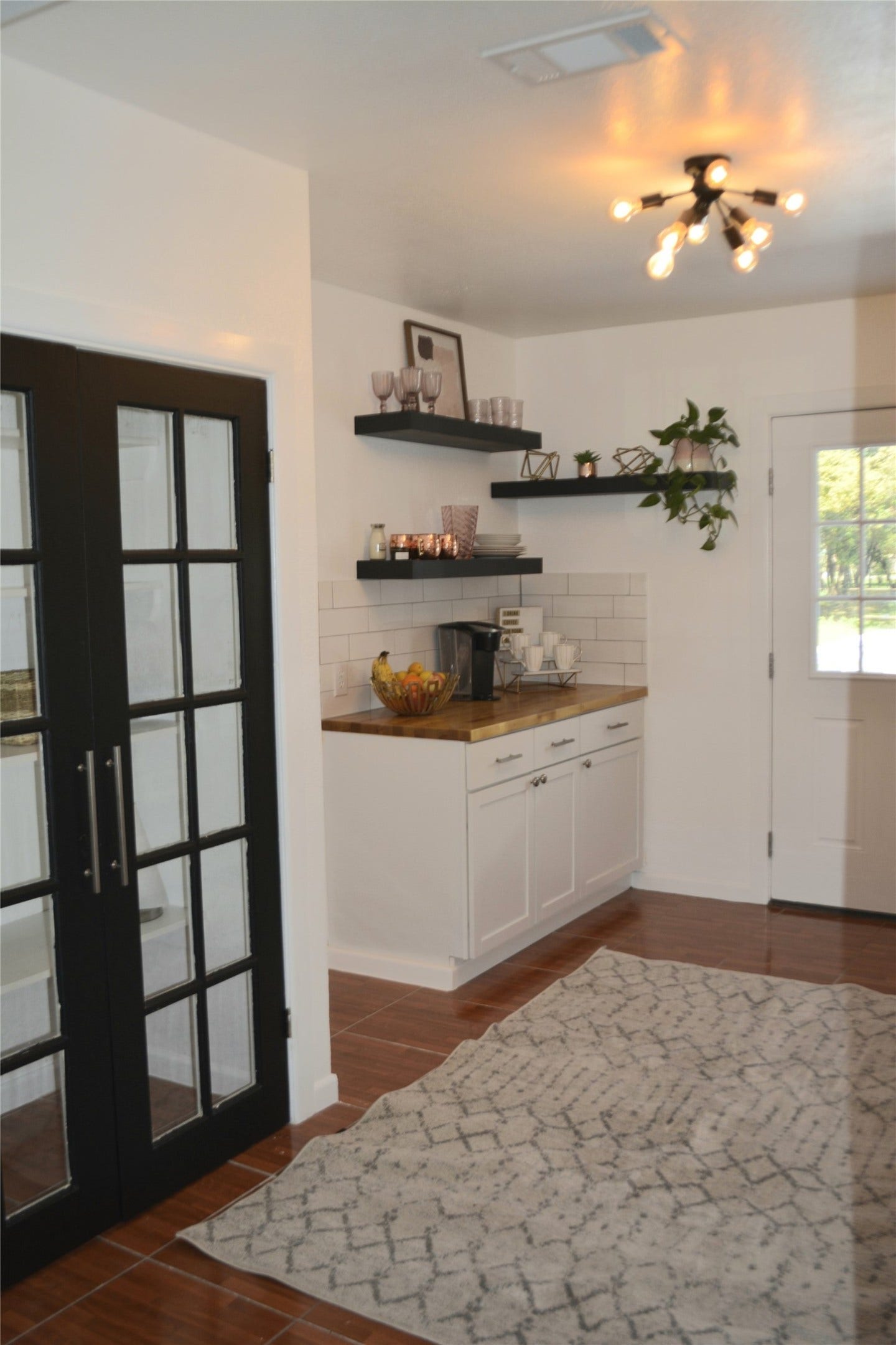 828 Holly Street, La Marque, TX 77568 Kitchen with Black Doors for Pantry