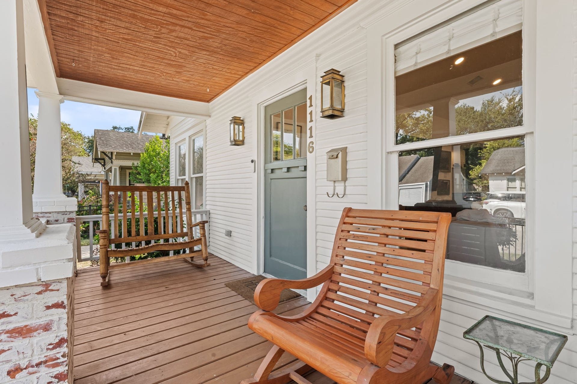 Covered front porch perfect for relaxing!