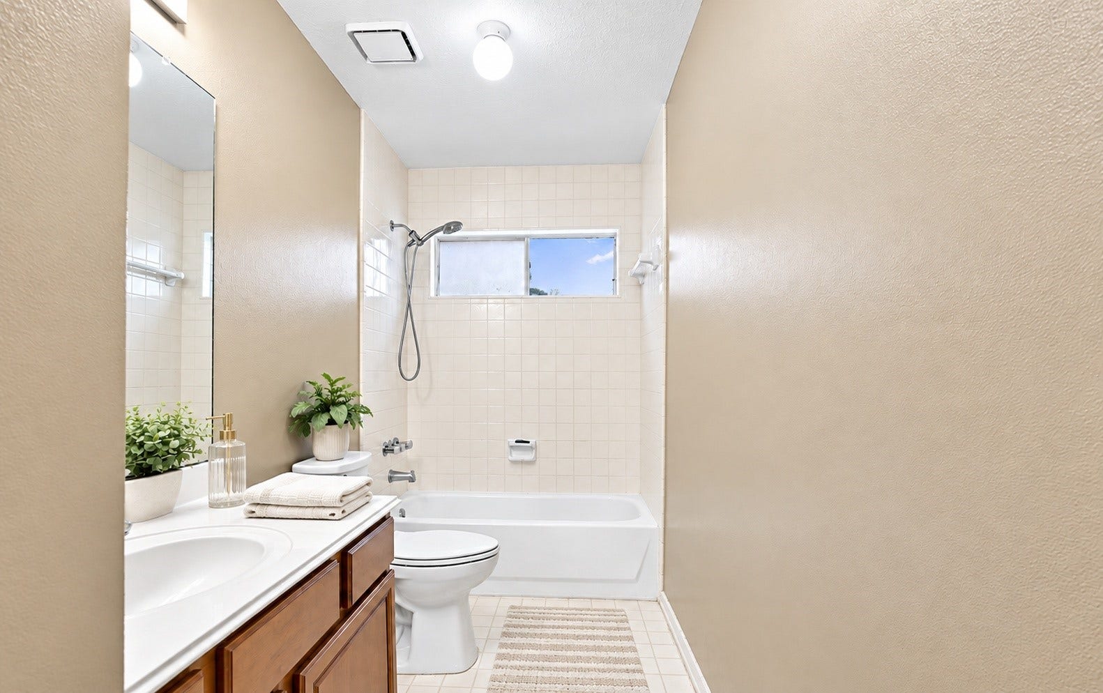 The secondary bathroom has a tub and shower combo!