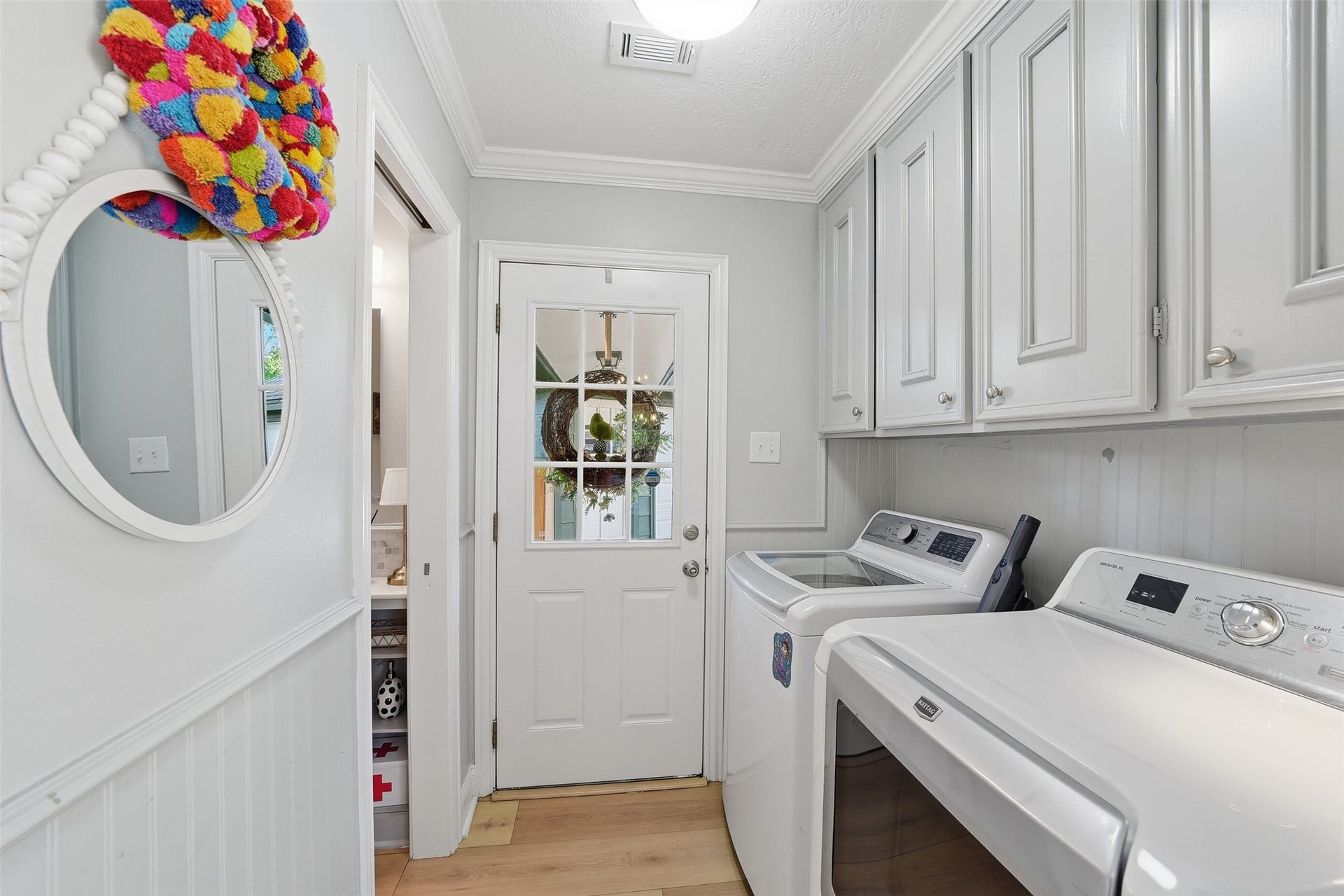 7611 Mauna Kai Drive, Houston, TX 77095 Utility room and half bath.