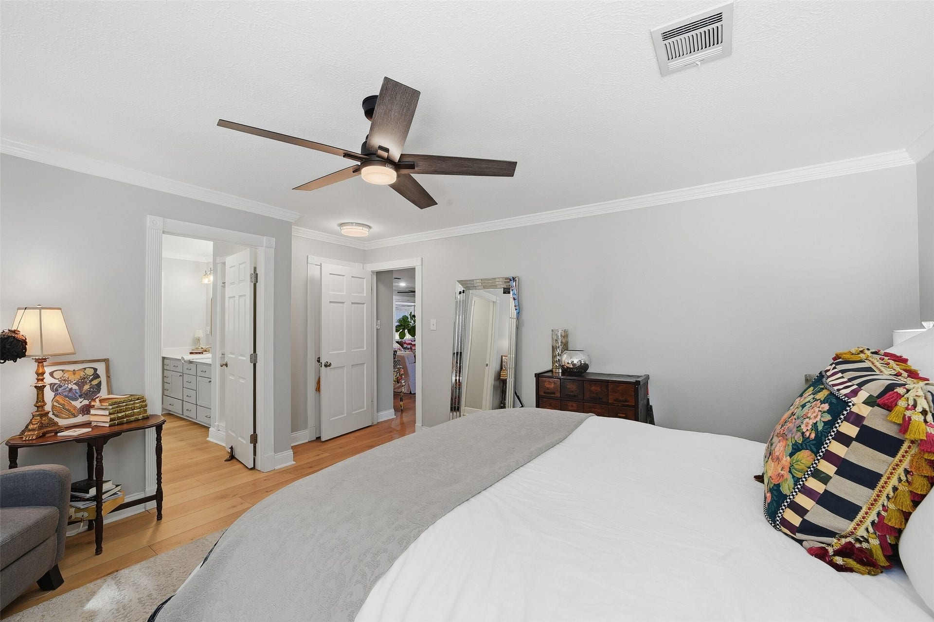 7611 Mauna Kai Drive, Houston, TX 77095 Primary bedroom with crown molding and lots of light and storage.