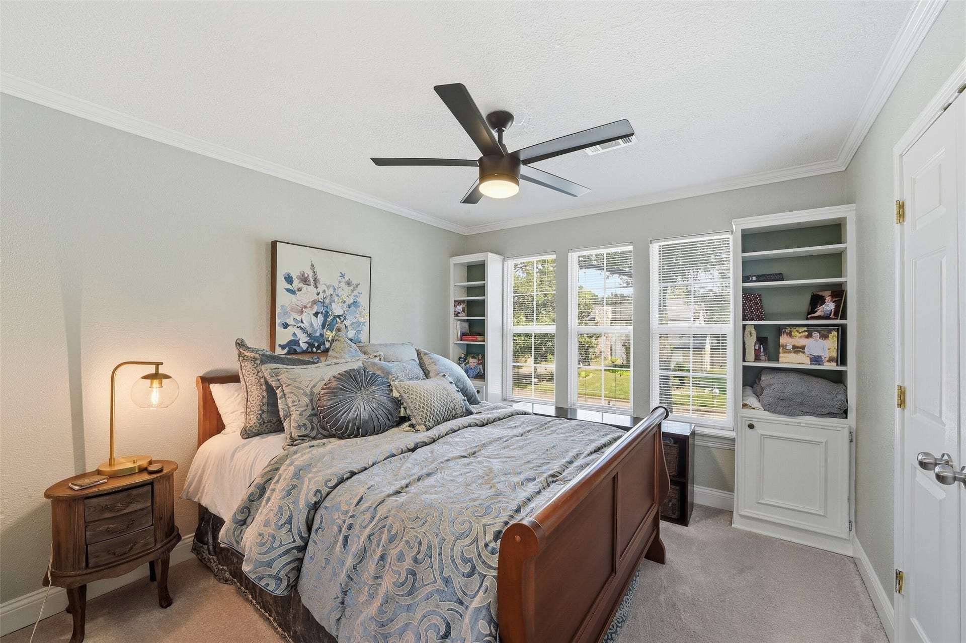 7611 Mauna Kai Drive, Houston, TX 77095 Bedroom 2 more windows and built-ins and a large closet.