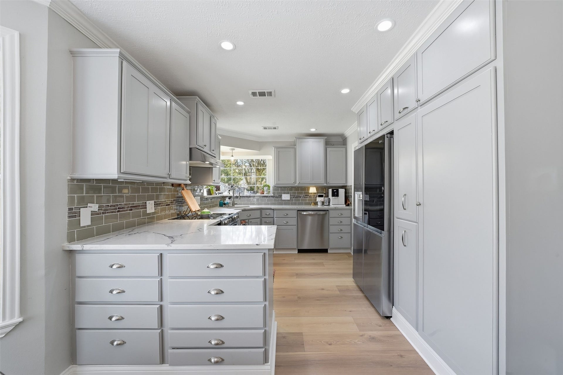 7611 Mauna Kai Drive, Houston, TX 77095 Lots of sunshine and storage everywhere.