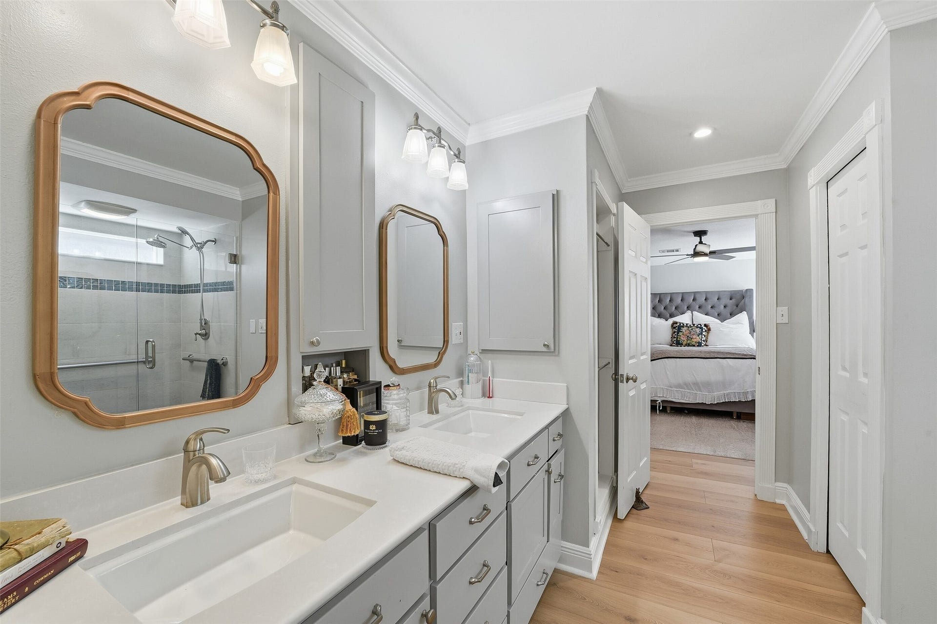 7611 Mauna Kai Drive, Houston, TX 77095 Ensuite bath with his and hers vanities and closets.