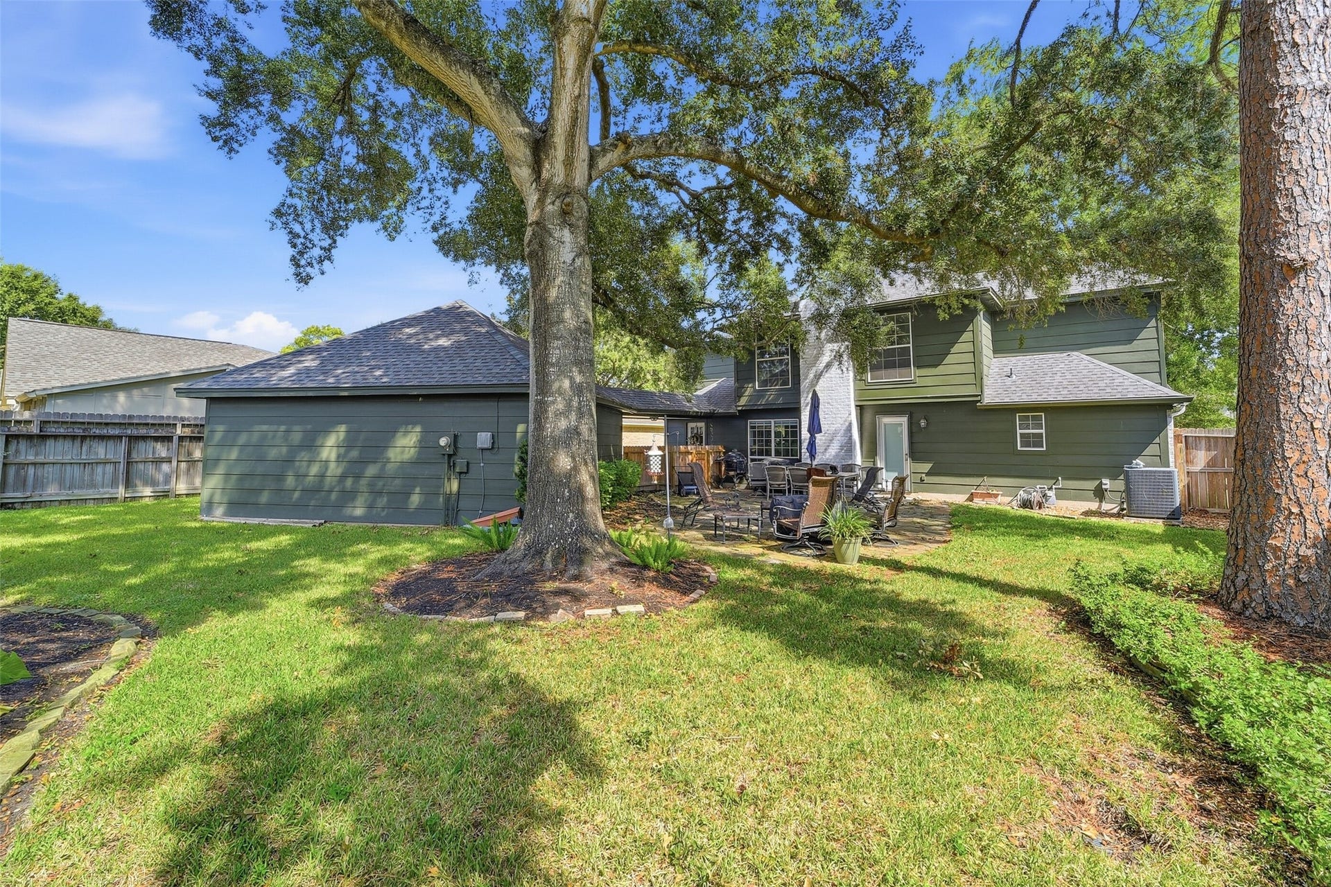 7611 Mauna Kai Drive, Houston, TX 77095 Big gorgeous backyard with patio and lots of shade.