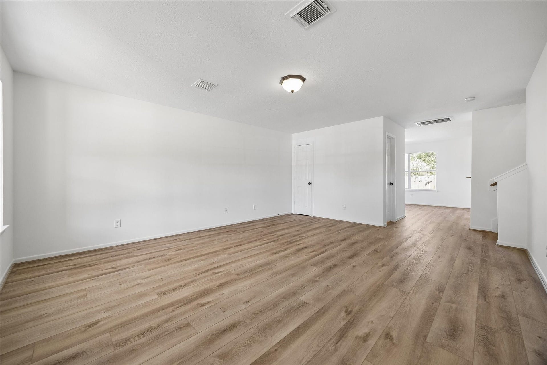 15847 Aldridge Creek Court, Cypress, TX 77429 This beautifully updated, spacious living room offers the perfect setting for gathering with family and friends. Large windows fill the space with natural light, creating a bright, warm, and inviting atmosphere. With plenty of room to relax, entertain, and enjoy each other's company, this welcoming space is truly the heart of the home, where everyday moments turn into lasting memories.