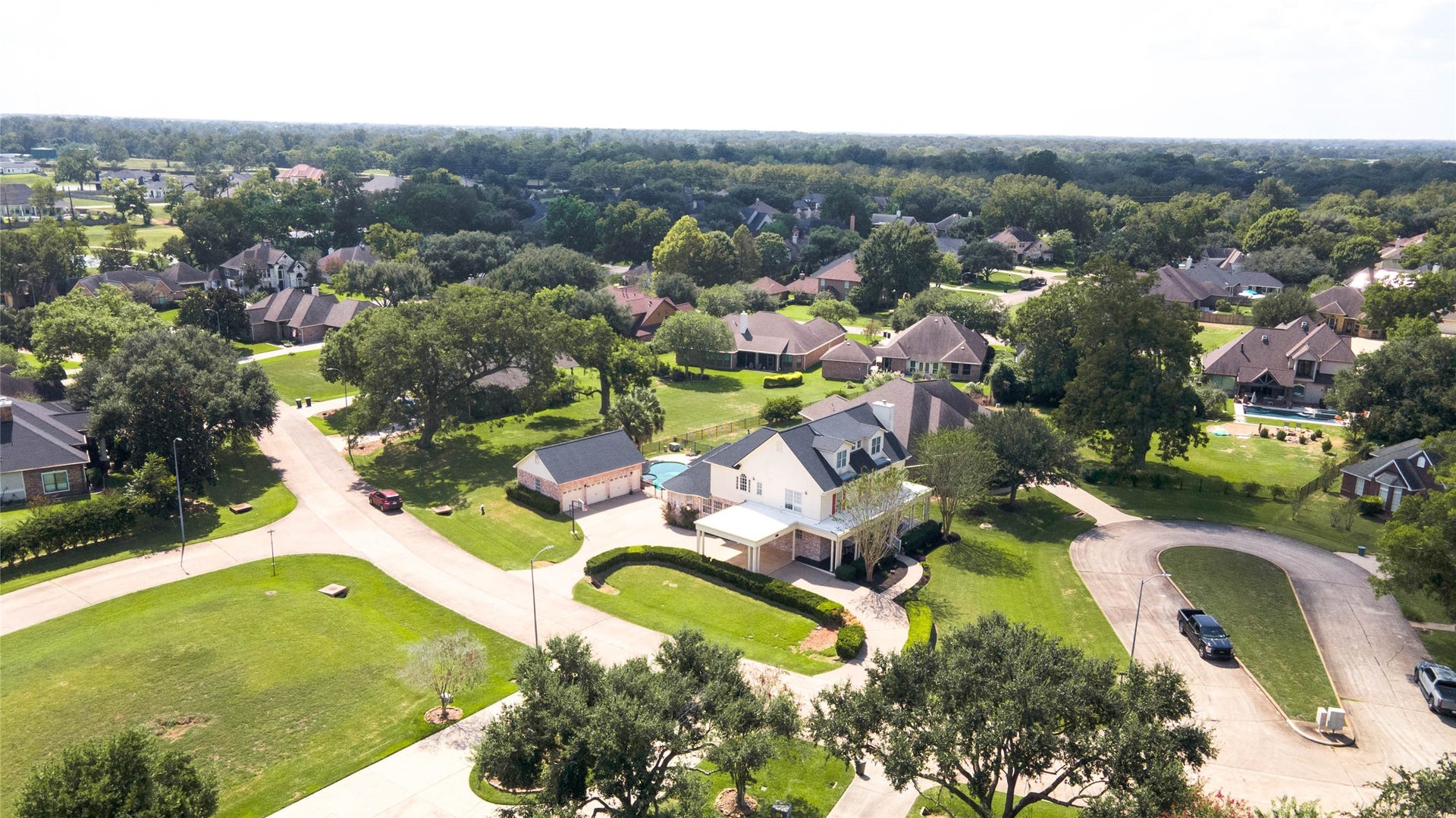 33103 Whickham Circle, Fulshear, TX 77441 The propertys distinctive architecture and generous homesite remain prominent within the neighborhood setting.
