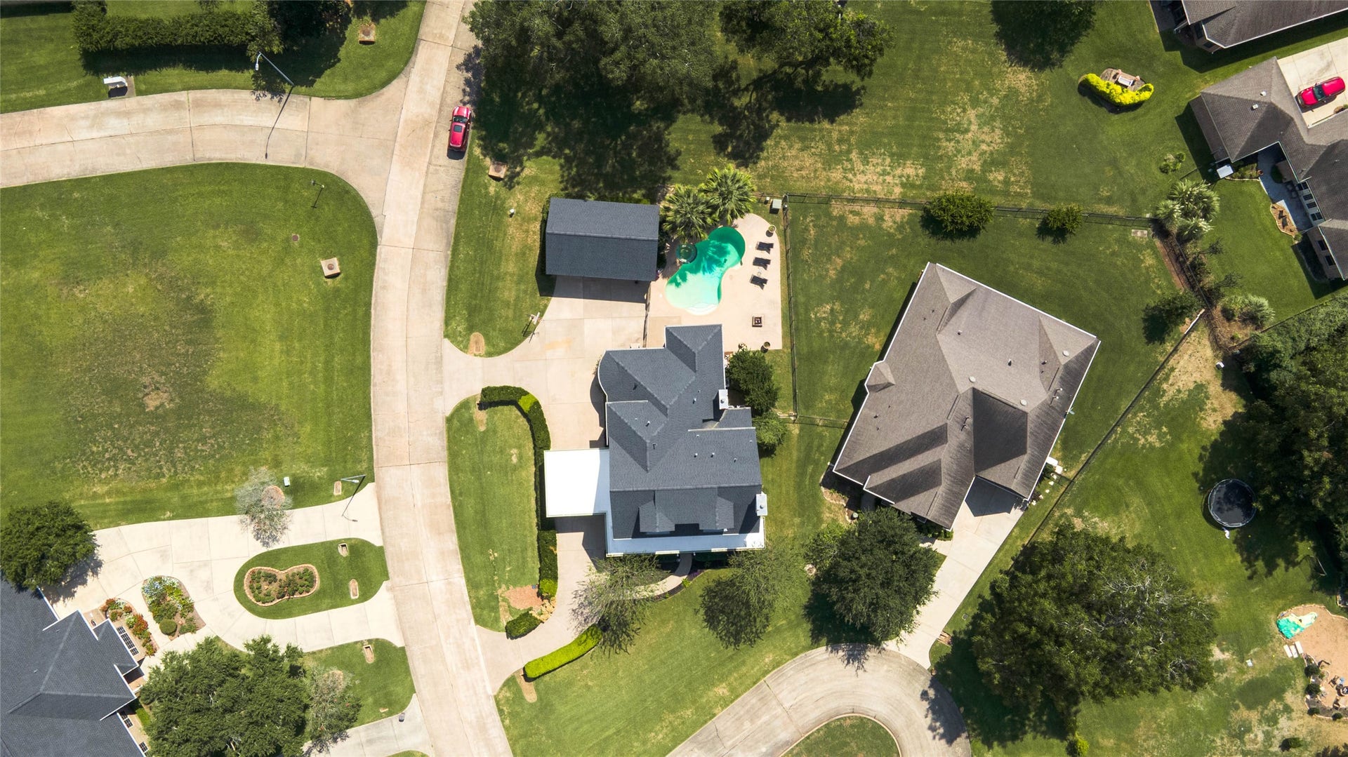 33103 Whickham Circle, Fulshear, TX 77441 From directly above, the propertys impressive footprint is clearly displayed.