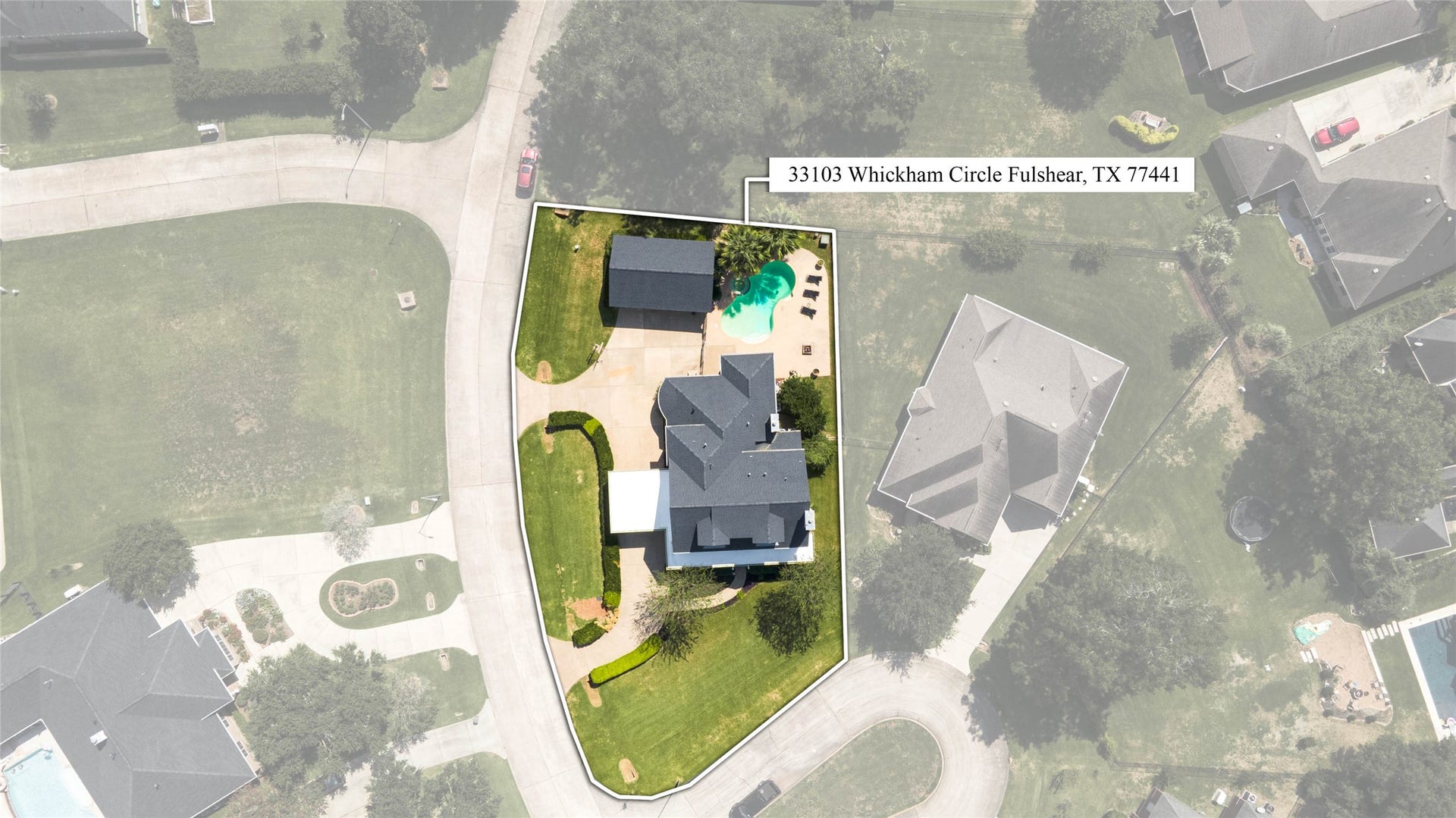 33103 Whickham Circle, Fulshear, TX 77441 A near-vertical aerial perspective reveals the distinctive configuration of the homesite and the thoughtful placement of the residence with it's estimated property lines.