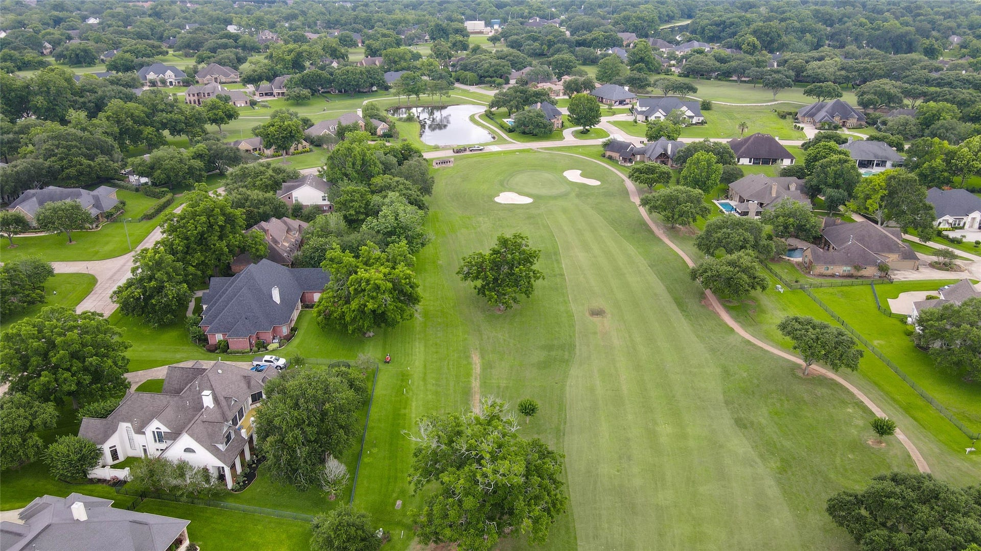 33103 Whickham Circle, Fulshear, TX 77441 Whether you're an avid golfer or simply appreciate the beauty of golf course living, the course provides a stunning backdrop that enhances the community's resort-style atmosphere.