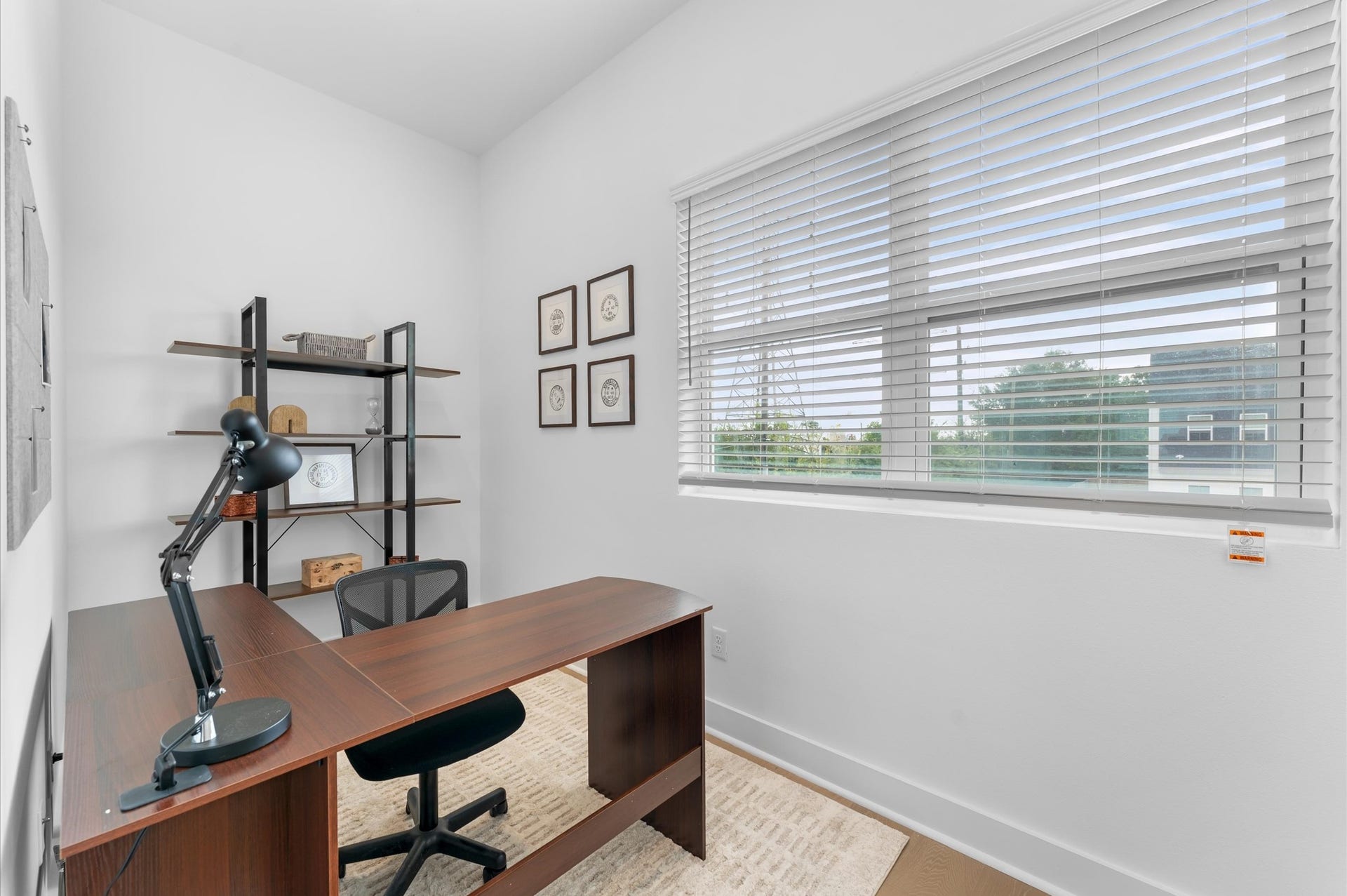 Tucked behind the kitchen on the second floor, this versatile flex room offers endless possibilitiesperfect as a home office, gym, or play area for kids making it a valuable extension of the open-concept living space.