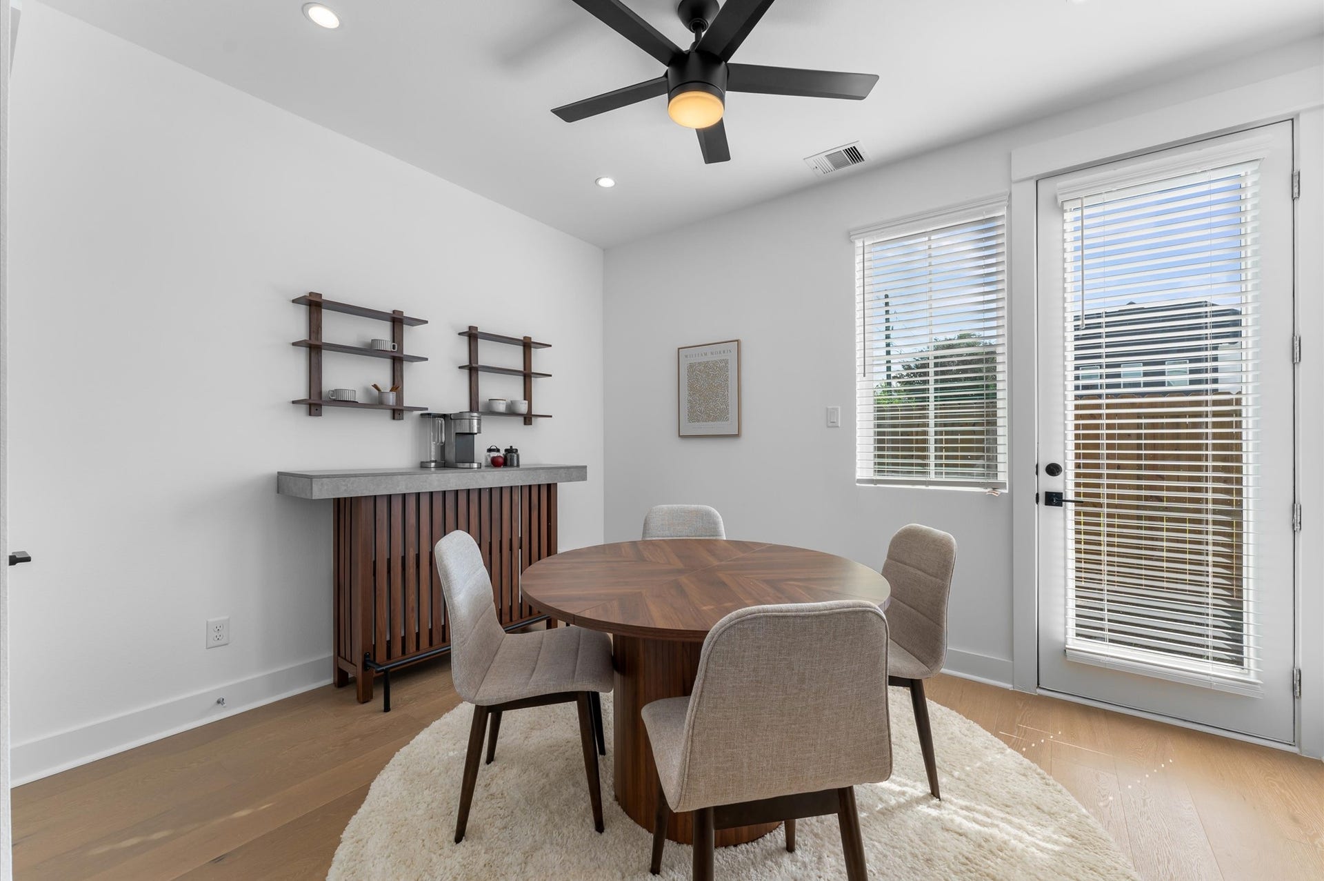 This versatile first-floor secondary bedroom offers private access to the backyard and includes its own full bathroom with a shower/tub combo, making it an ideal space for guests, in-laws, or a comfortable home office retreat.