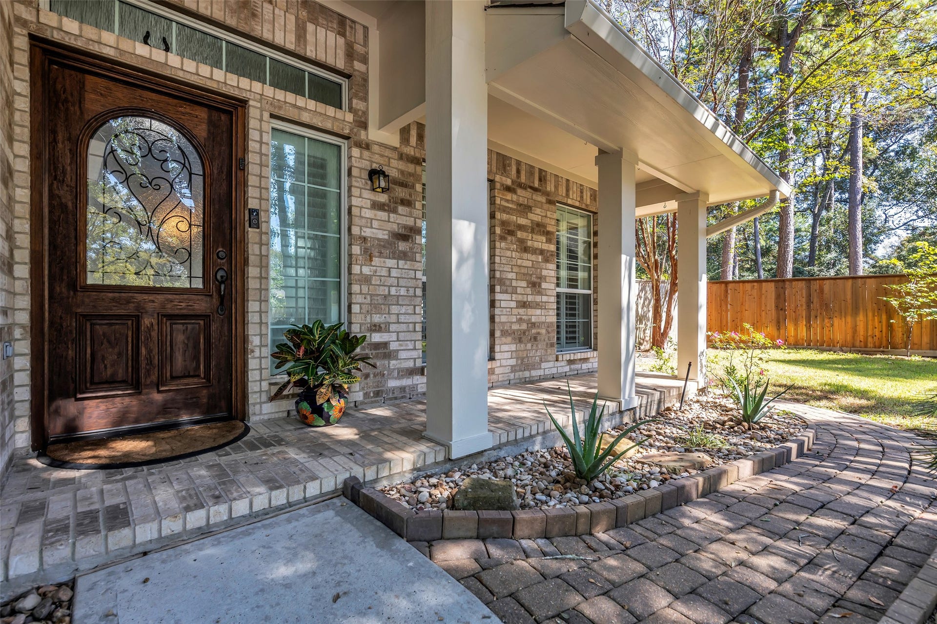 39 Currymead Place, The Woodlands, TX 77382 Great front porch for watching sunset or neighbors