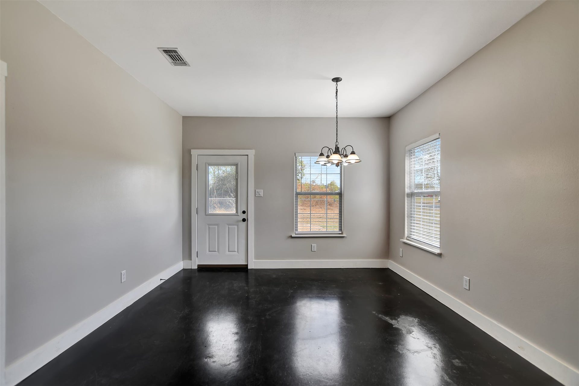 2546 16th Street, Hempstead, TX 77445 The dining area includes a view of the outdoors through a glass-paneled door.