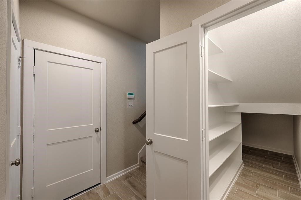 115 Handley Drive, Montgomery, TX 77316 Huge walk in closet with ample shelving for storage.