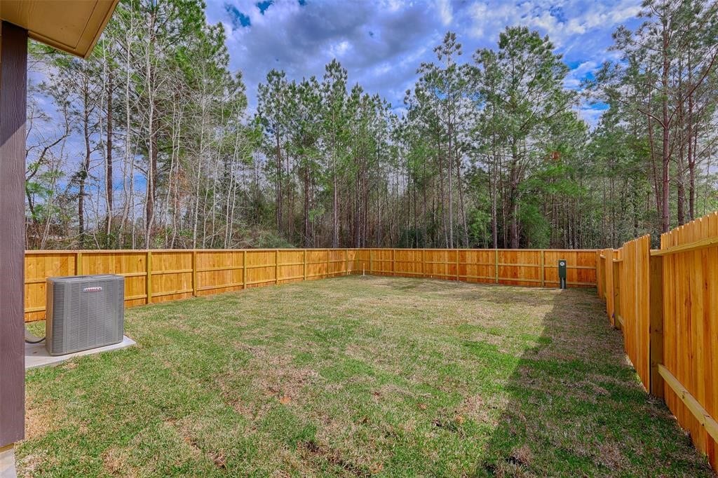 115 Handley Drive, Montgomery, TX 77316 HARD TO FIND LARGE PRIVATE BACKYARD WITH GREENBELT ON SIDE AND REAR!