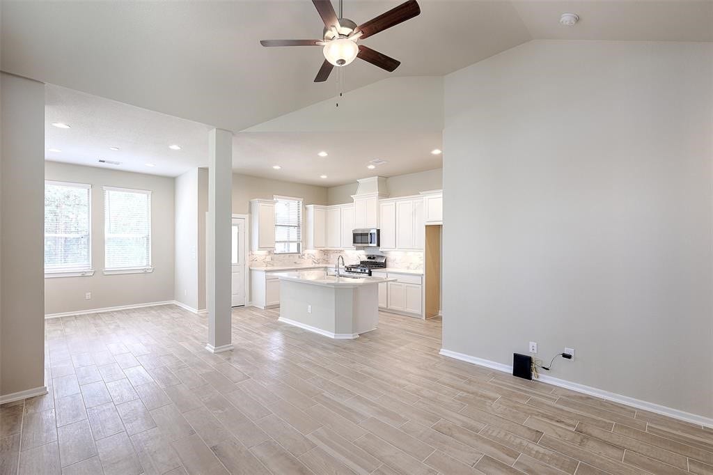 115 Handley Drive, Montgomery, TX 77316 Open living area with island kitchen