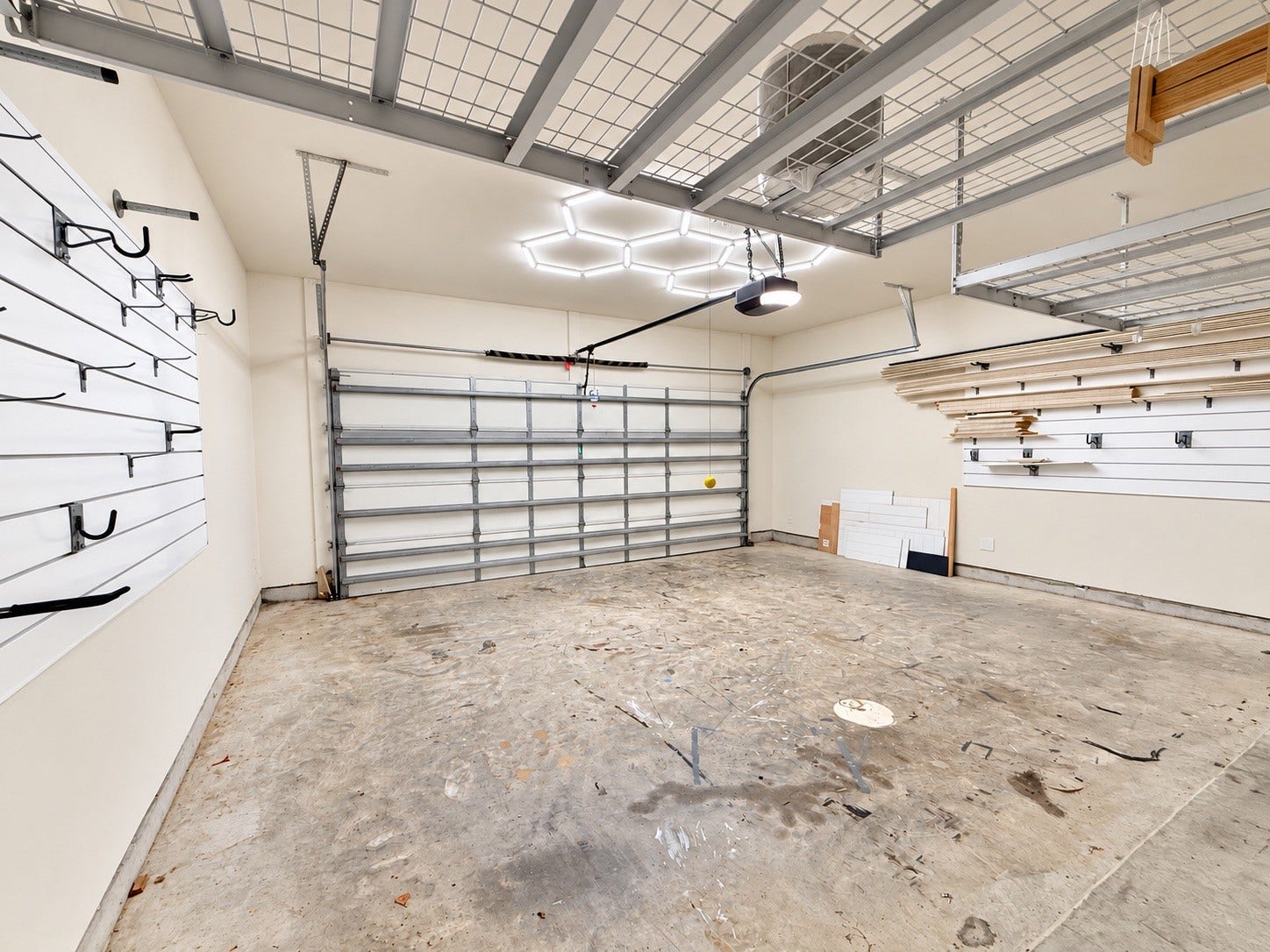 The garage is ideal for various projects and offers excellent storage space.