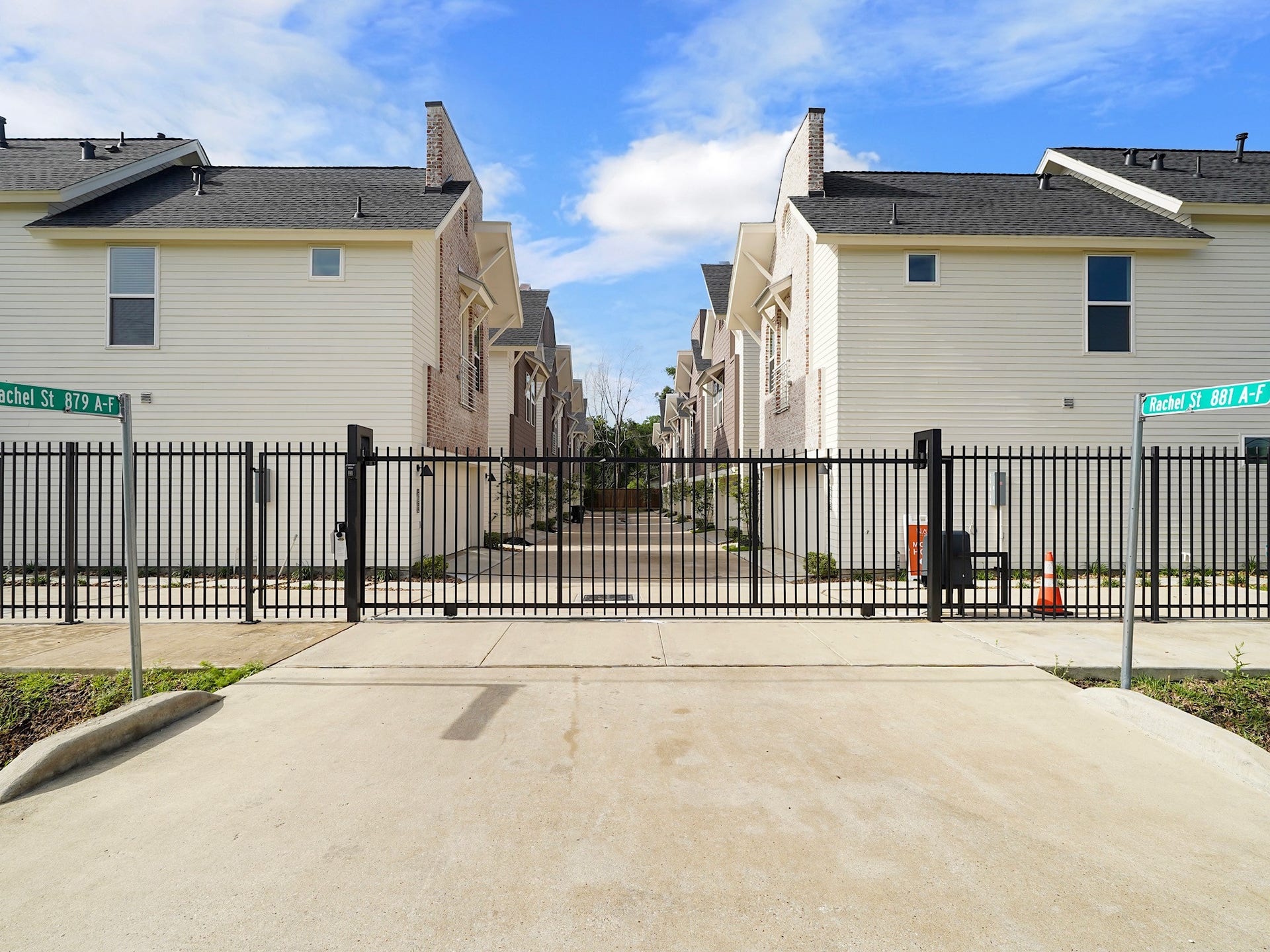 881 Rachel Street, #A, Houston, TX 77091 Modern townhouse complex with gated entrance, featuring light exteriors and neatly arranged units. Ideal for secure, community living.
Photo Disclaimer: Photos are representative of the community and may depict a similar floor plan, model home, or previously completed residence.