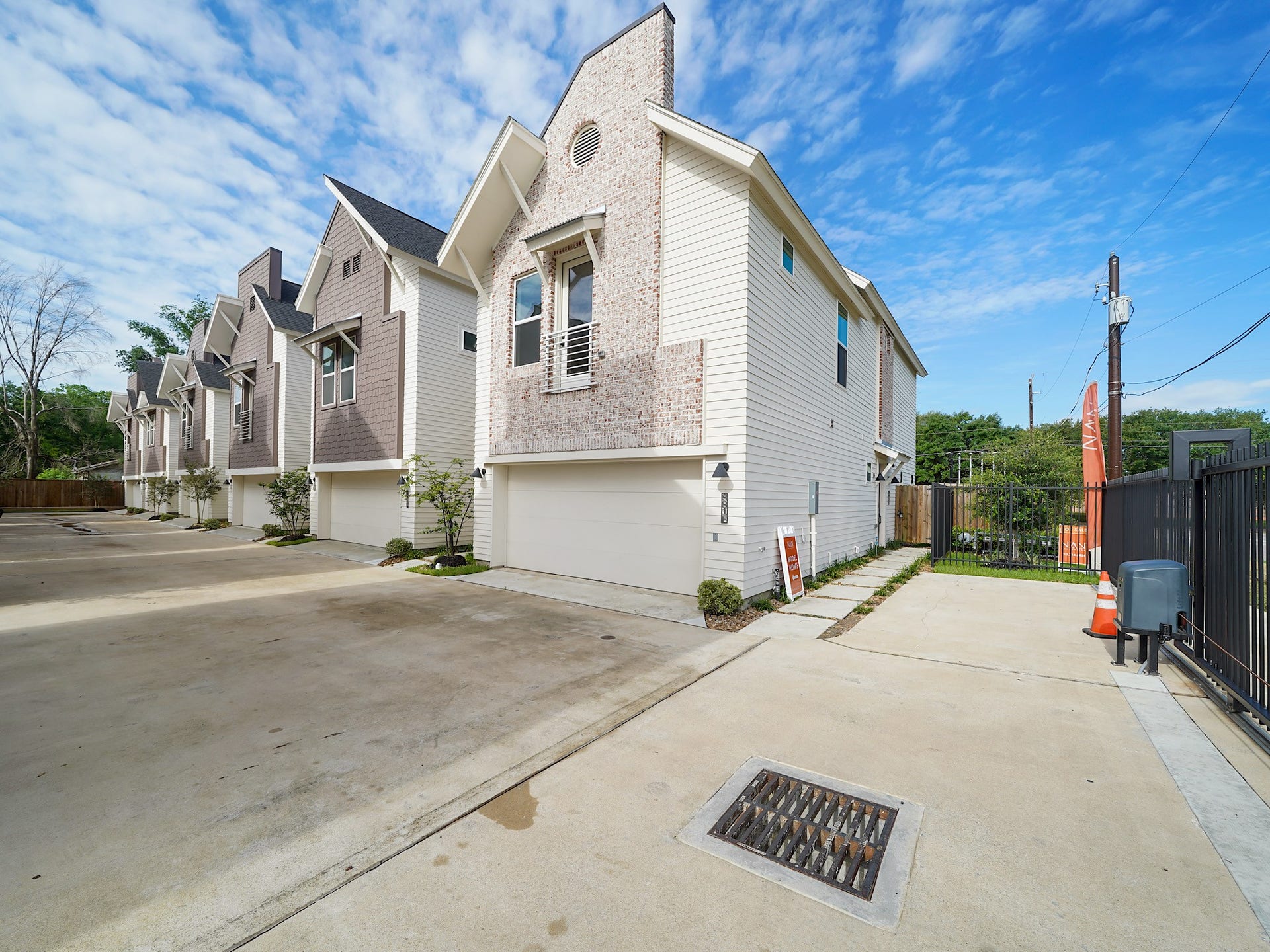 881 Rachel Street, #A, Houston, TX 77091 Modern townhouses with a clean, spacious driveway and contemporary design. The homes feature gabled roofs, brick and siding exteriors, and attached garages. The area is well-maintained with a gated entrance, offering a sense of security and privacy.
Photo Disclaimer: Photos are representative of the community and may depict a similar floor plan, model home, or previously completed residence.