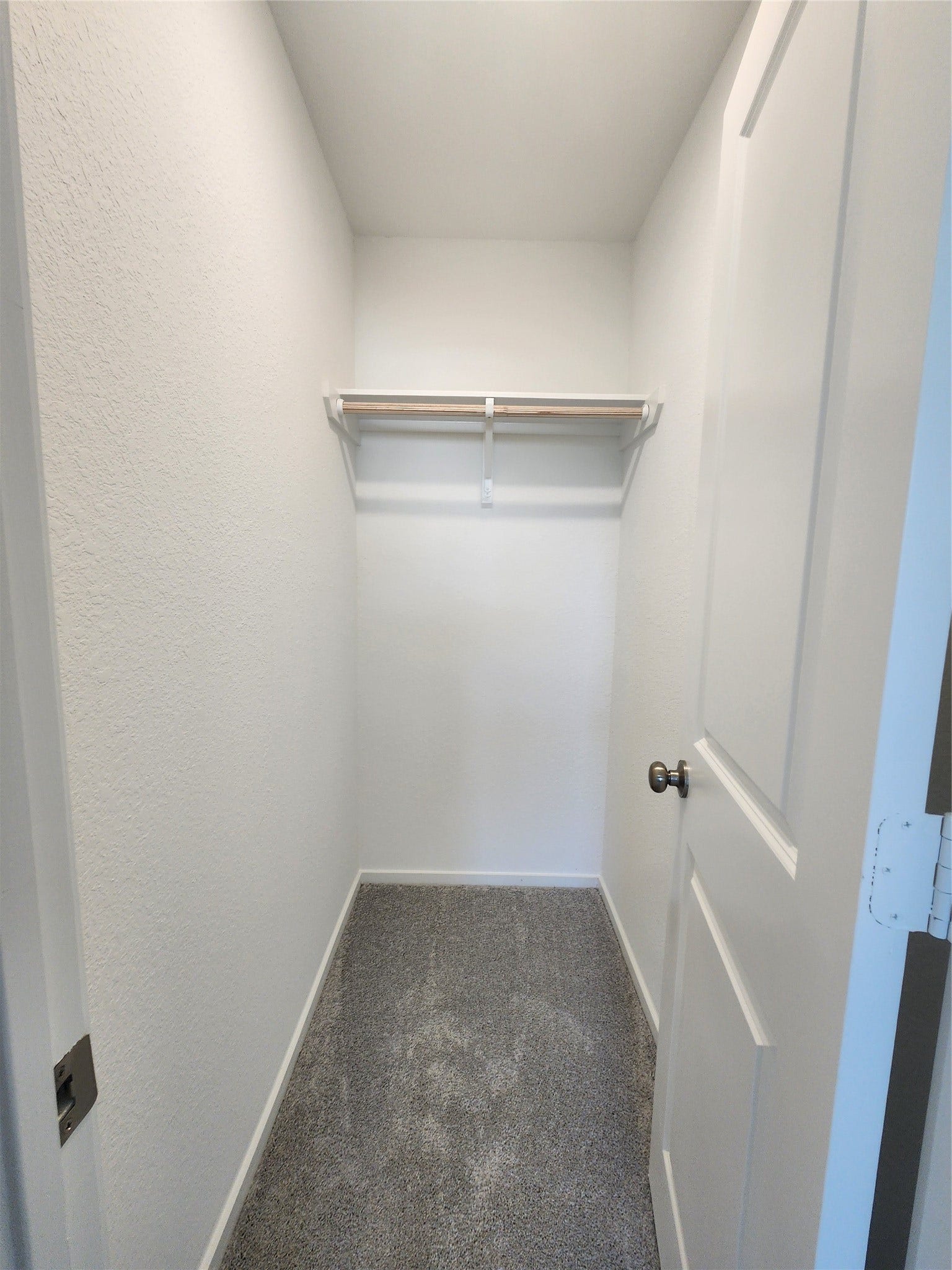 17307 Adina Creek Court, Crosby, TX 77532 Photo of the secondary closet in the secondary bedroom.