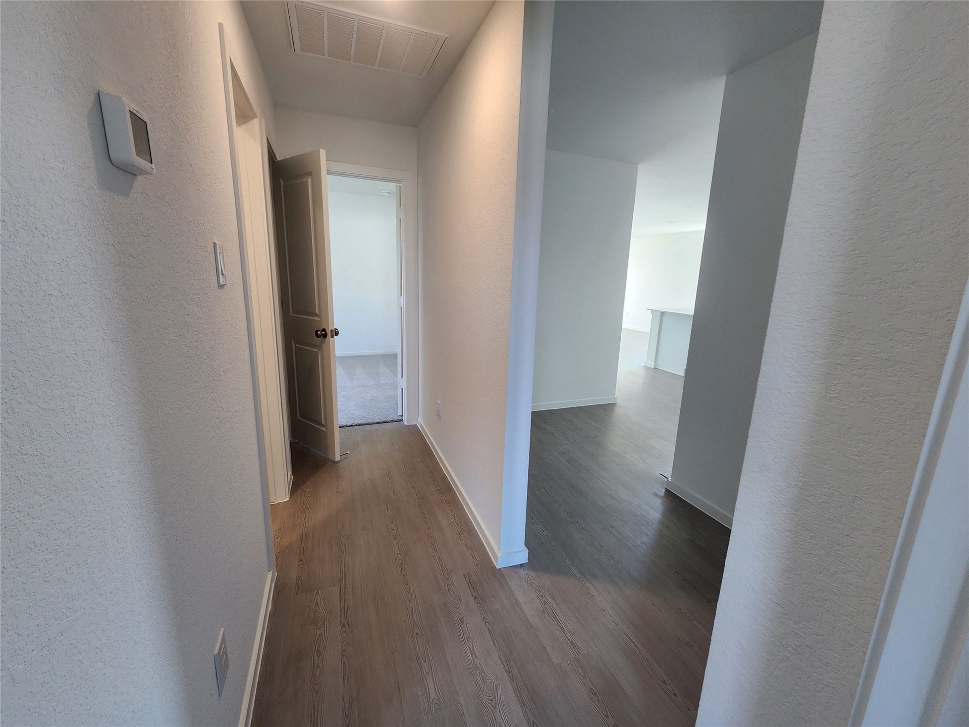 17307 Adina Creek Court, Crosby, TX 77532 Another view of the hallway with entrances to bedrooms, secondary bathroom.