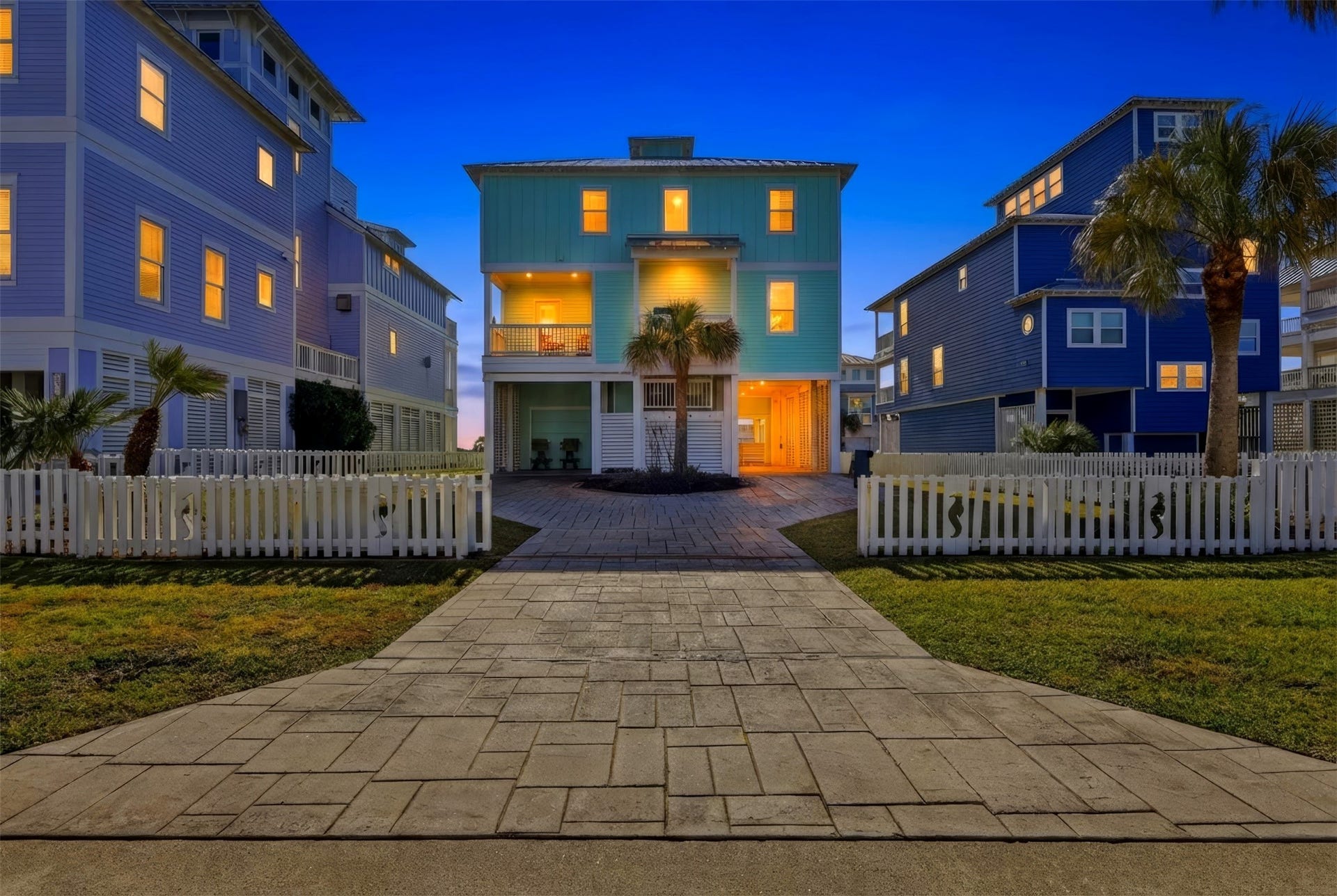 11622 Beachside, Galveston, TX 77554 A charming beach house with ample parking for guests and a gated driveway that closes for added privacy and convenience.
