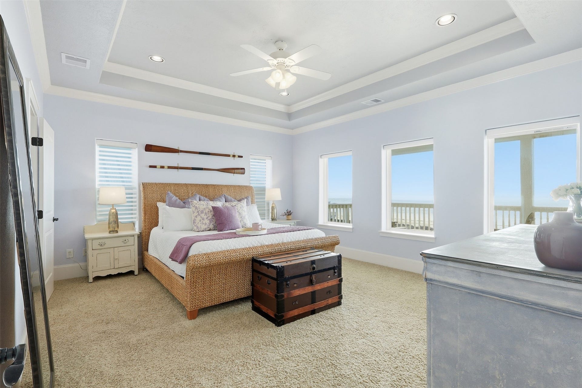 11622 Beachside, Galveston, TX 77554 This spacious bedroom features large windows that fill the room with natural light and offer beautiful ocean views, along with a comfortable king size bed for ultimate relaxation.