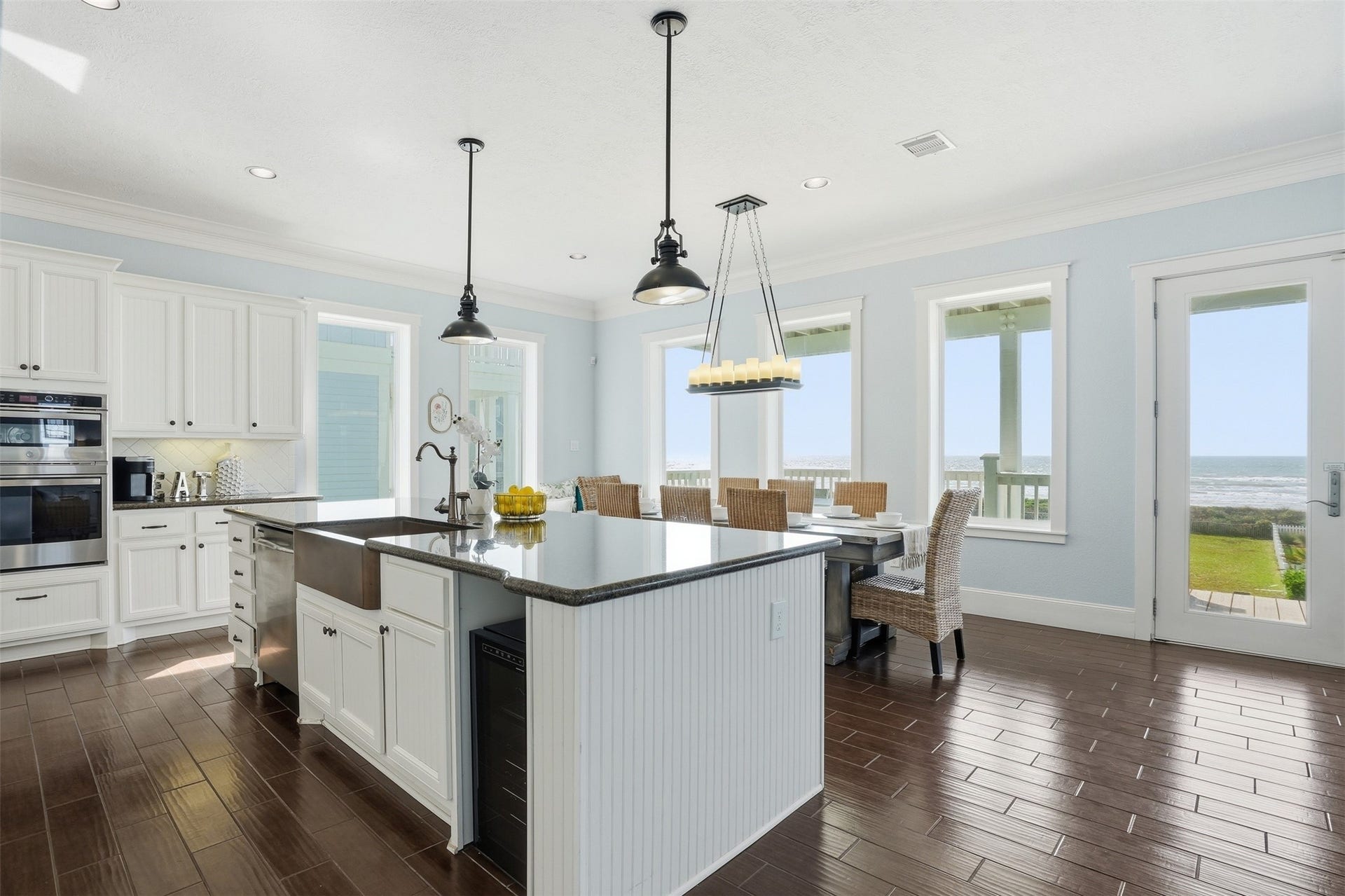 11622 Beachside, Galveston, TX 77554 Bright and spacious kitchen with modern appliances, large island, and elegant lighting with direct views of the gulf.
