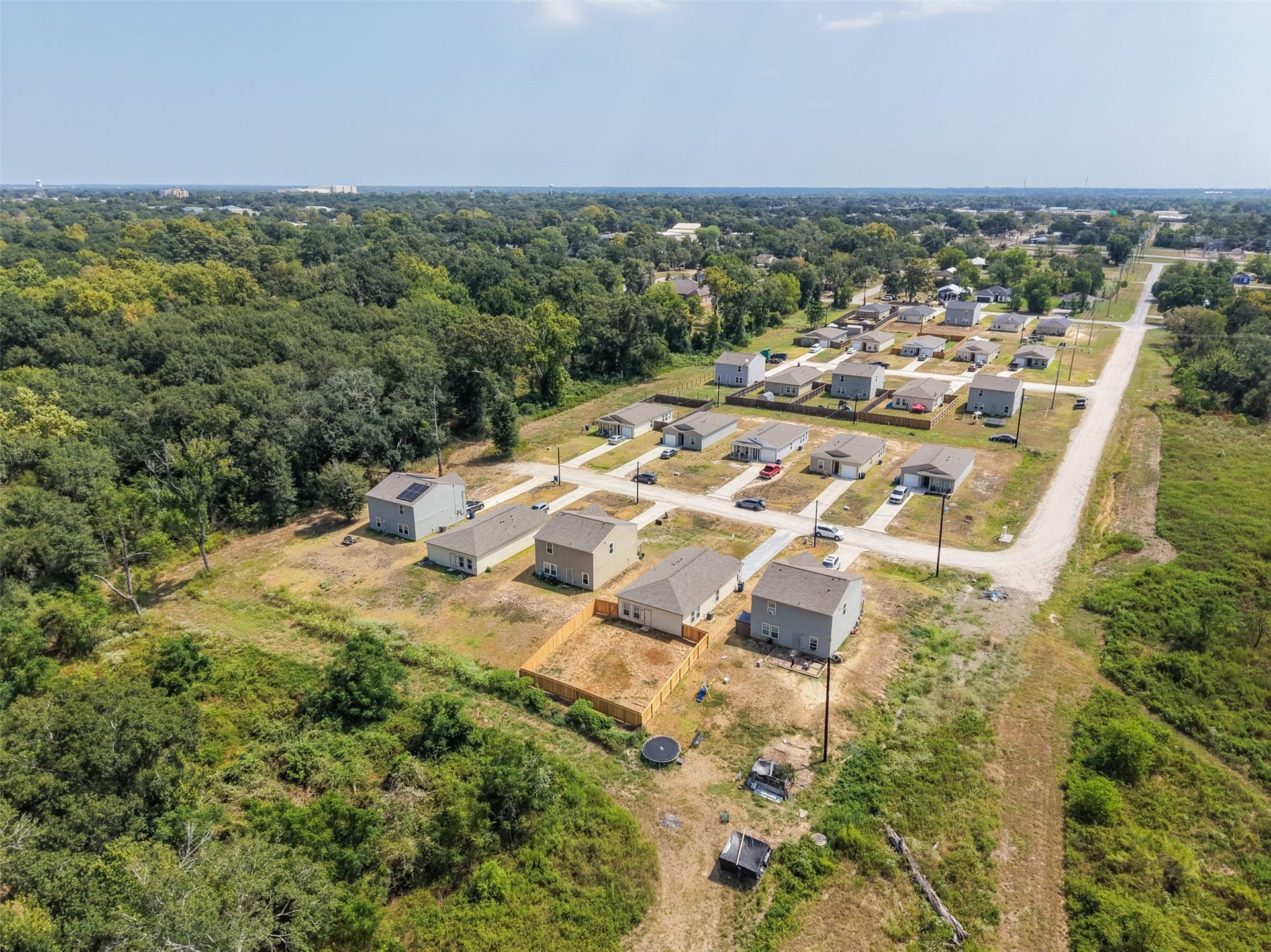 2537 18th Street, Hempstead, TX 77445 Aerial view showcasing the neighborhood, surrounding open space, and residential growth in the Hempstead area.
