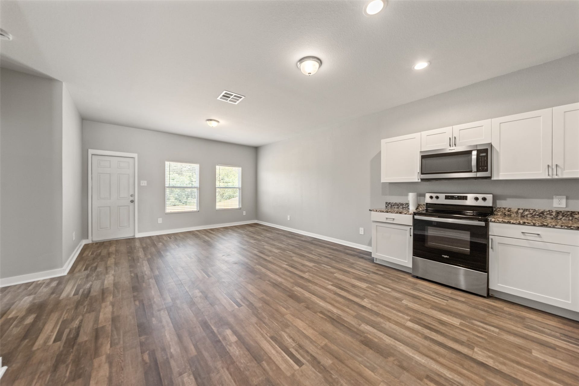 2537 18th Street, Hempstead, TX 77445 Open dining and kitchen area featuring recessed lighting and a seamless connection between the main living spaces.