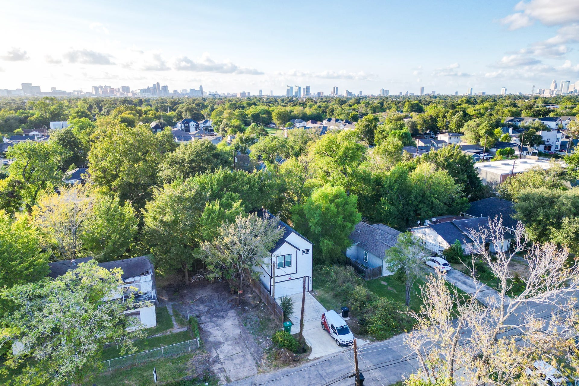 Aerial view of surrounding neighborhood