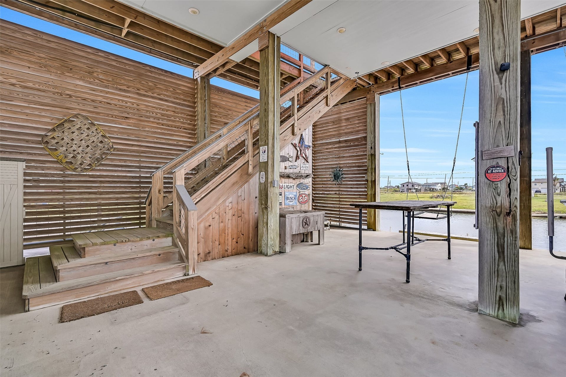 7119 Beau Rue Street, Hitchcock, TX 77563 A covered staircase means during inclement weather - you won't need to worry about getting to/from your vehicle.