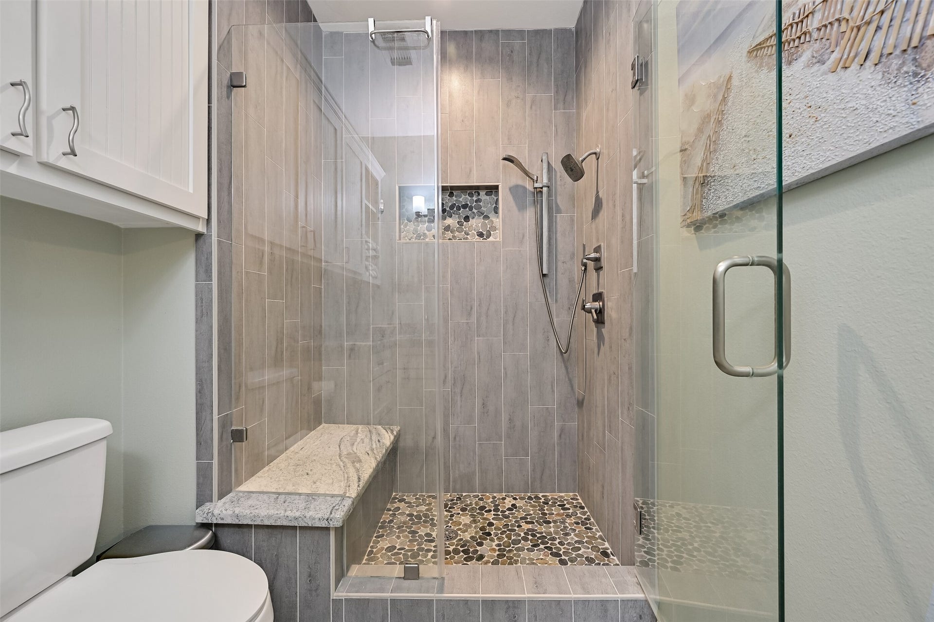 7119 Beau Rue Street, Hitchcock, TX 77563 We have the same spa-like shower with a tiled enclosure, pebble floor, & granite bench.